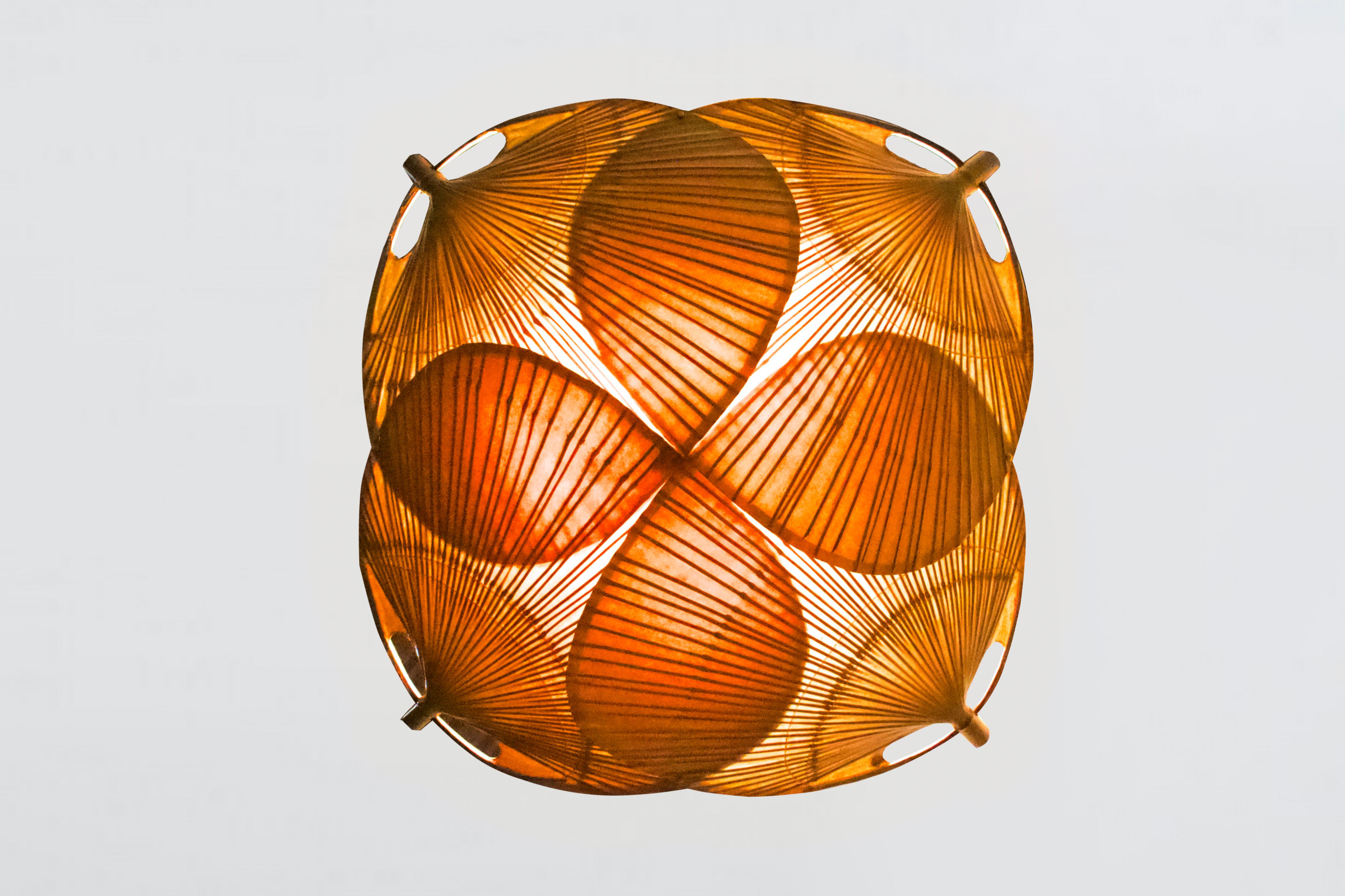 Large ‘Yotsuba’ chandelier in excellent condition.

Designed by Ingo Maurer in the 1970s 

Manufactured by M Design, Germany

The ‘Yotsuba' chandelier is only produced for one year.

It is handmade from bamboo and Japanese rice paper and