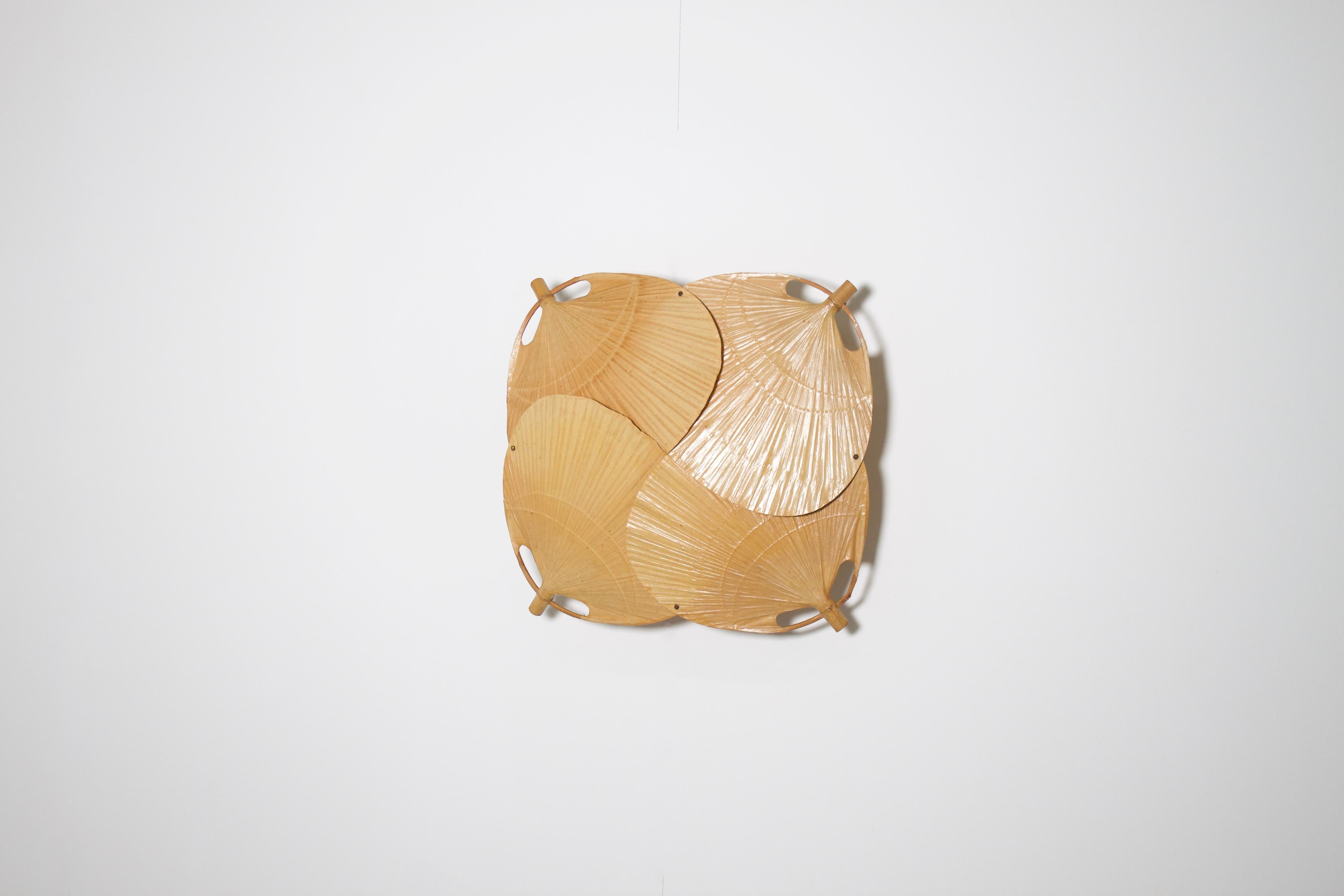 Large ‘Yotsuba’ wall light in very good condition.

Designed by Ingo Maurer in the 1970s 

Manufactured by M Design, Germany

The 'Yotsuba' is handmade from bamboo and Japanese rice paper and is connected to the wall with a metal frame

The