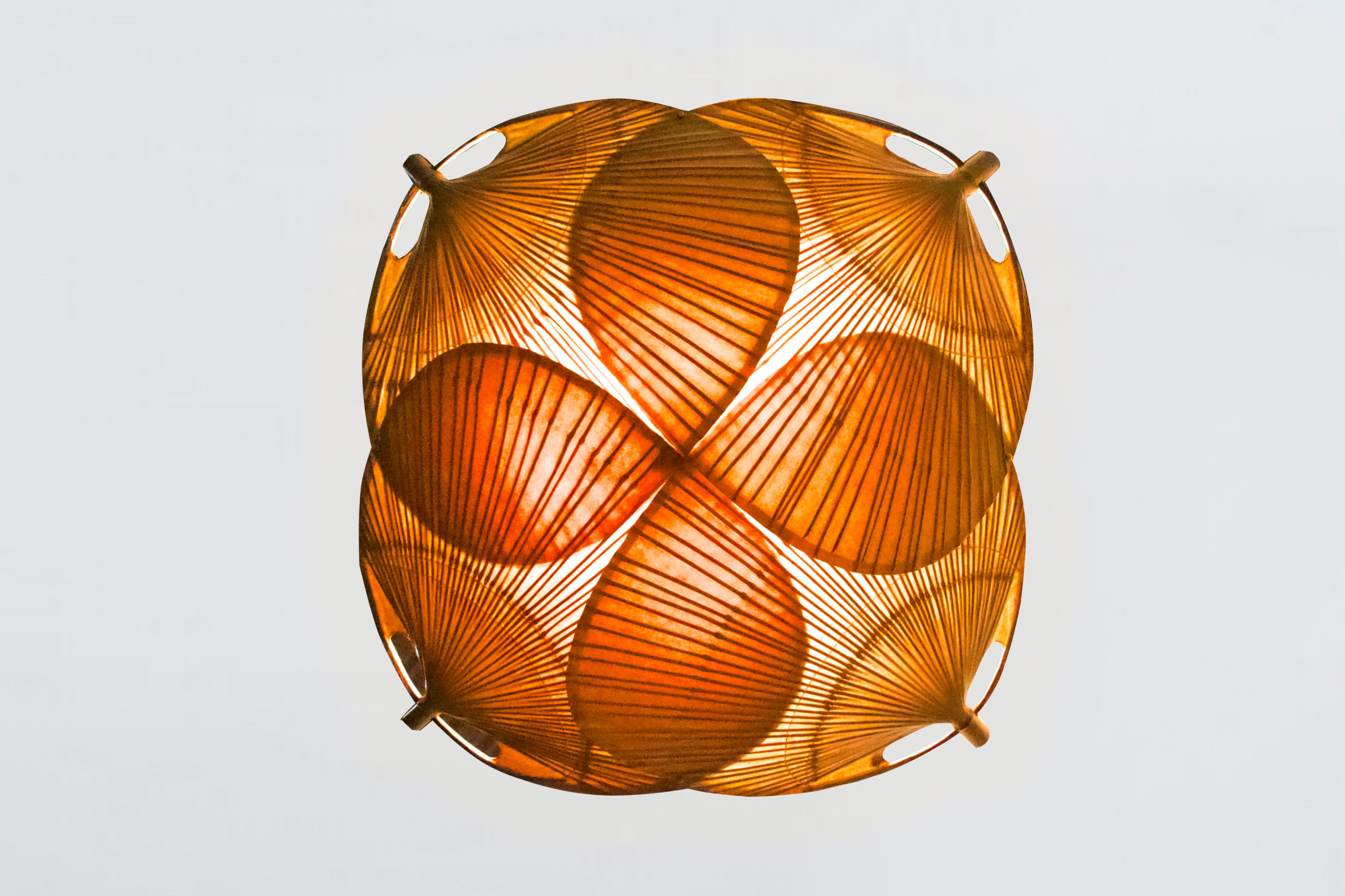 Large ‘Yotsuba’ chandelier in excellent condition.

Designed by Ingo Maurer in the 1970s 

Manufactured by M Design, Germany

The ‘Yotsuba' chandelier is only produced for one year.

It is handmade from bamboo and Japanese rice paper and hangs from