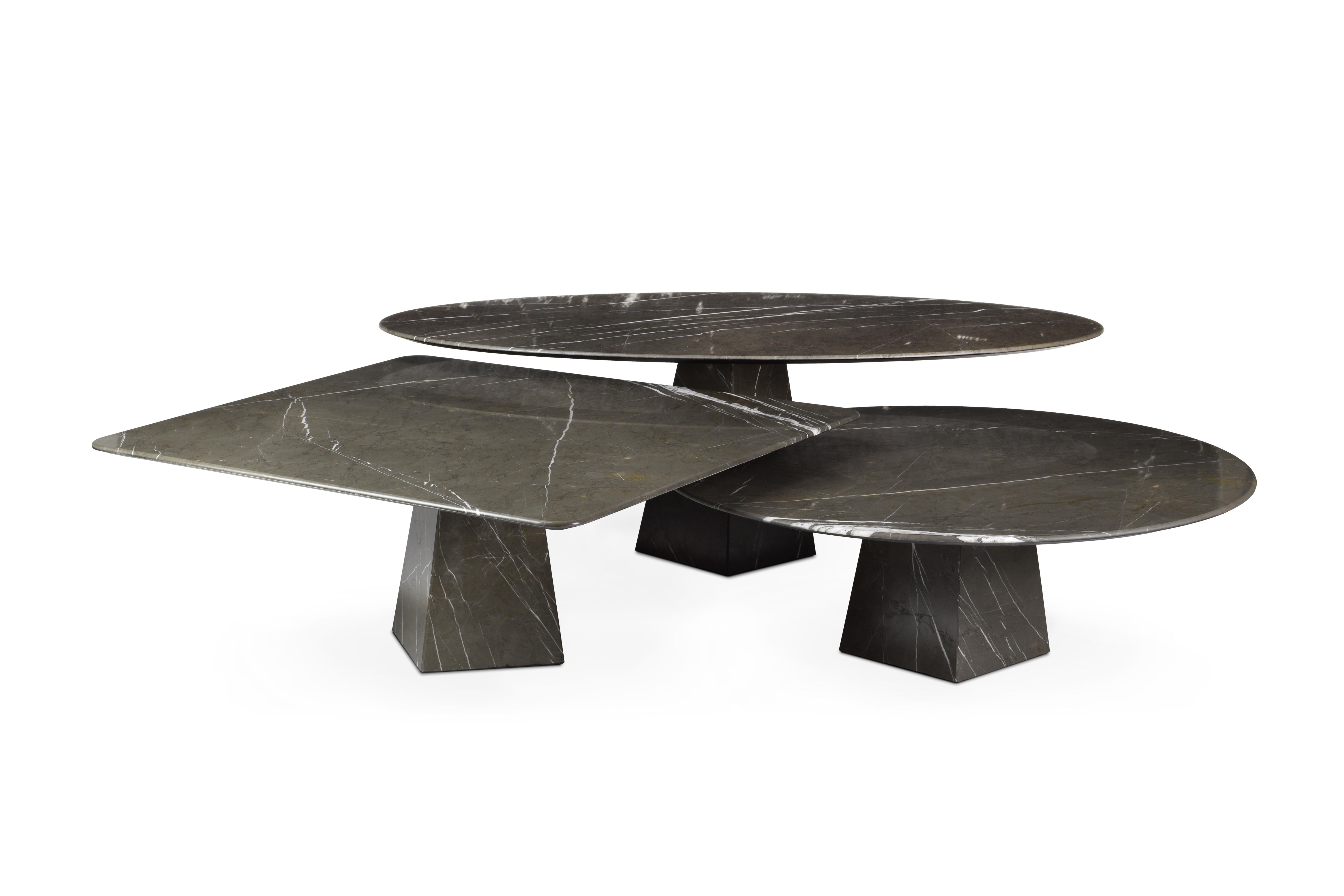 Ultra thin grey graphite matte marble squared coffee table
Inspired by the feeling of weightlessness and its connection to the space, crafted entirely in laminated stone.
This advanced technique allows us to get an ultra-thin and high resistant