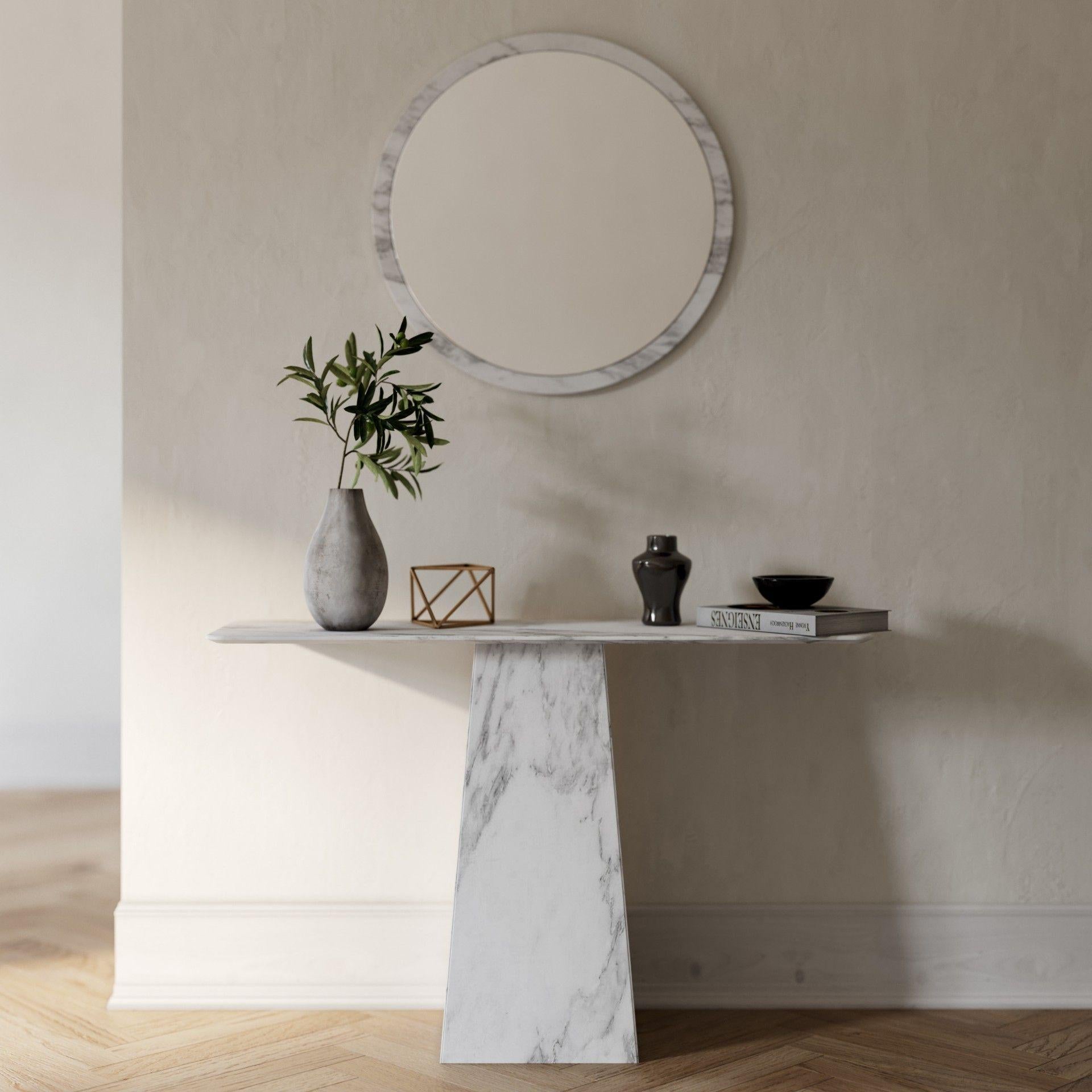 Inspired by the feeling of weightlessness and its connection to the space, crafted entirely in laminated stone.
This advanced technique allows us to get an ultra-thin and high resistant marble table top. The tables are light, simple, easy and