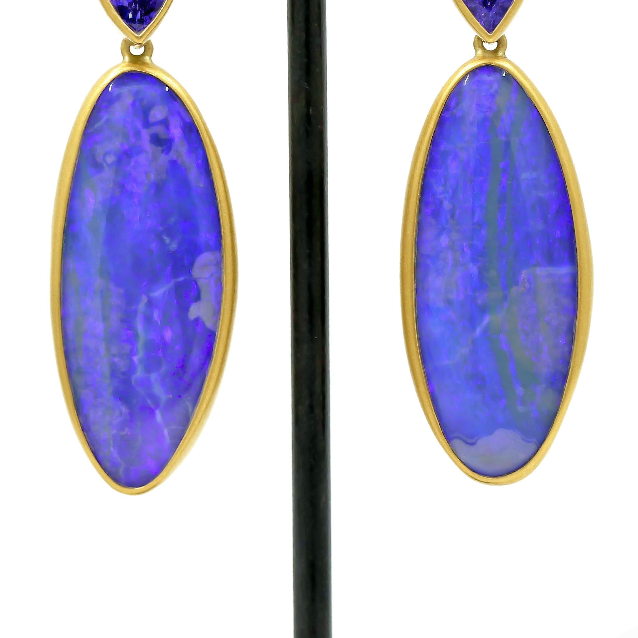 One of a Kind Long Drop Earrings by award-winning maker Lola Brooks, hand-fabricated in signature-finished 22k yellow gold featuring a magnificent matched pair of rare Australian ultramarine boulder opal totaling 31.52 carats, each bezel-set beneath