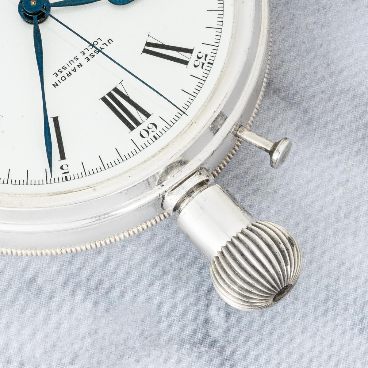 A Ulysee Nardin British Military Issue Keyless Lever Wind Deck Watch, made from silver, set in a brass outer cover which is set in a wooden deck box C1940s.


Dial: The perfect white enamel Roman dial signed Ulysee Nardin with blued steel spade
