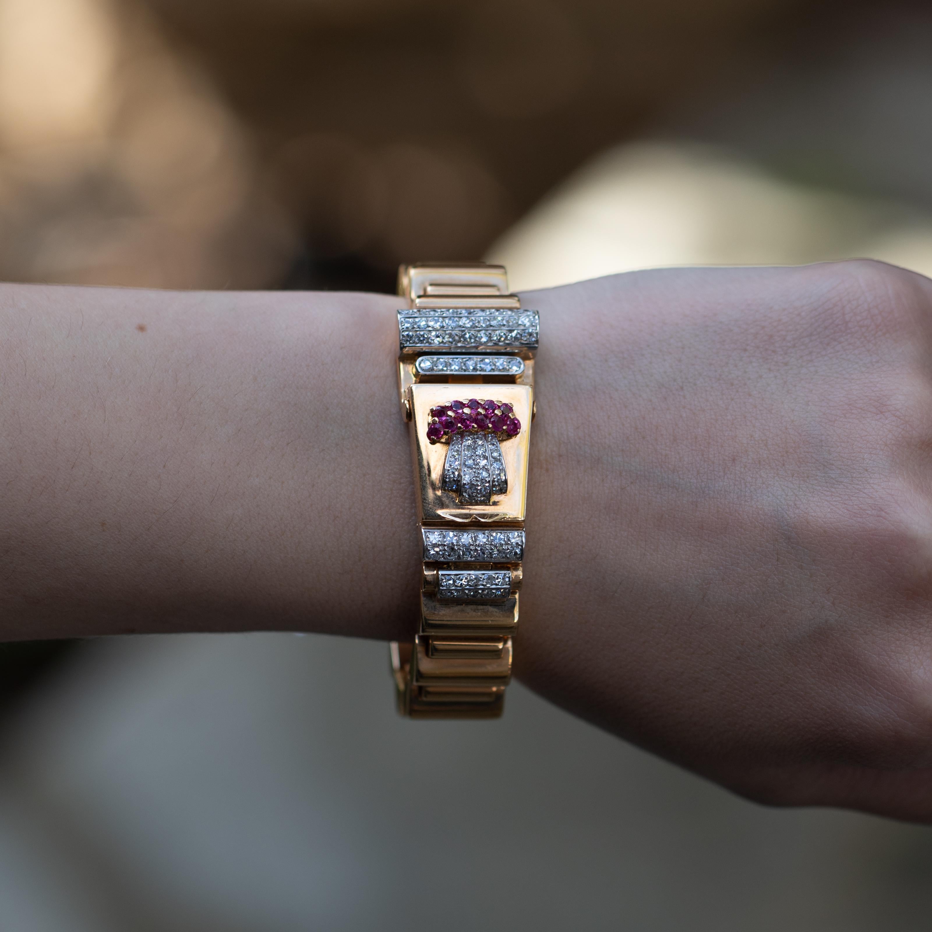 Elegant Ulysse Nardin Watch with a Beautiful Ruby and Diamond Design. 

Brand: Ulysse Nardin
Diamonds = 1.40 Carats
( Color: F, Clarity: VS )
Rubies = .40 Carats 
18K Yellow Gold
Length: 7 Inches 