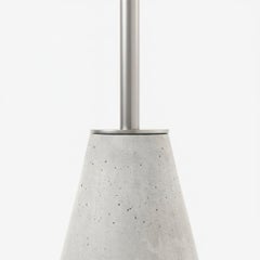 UM minimalist and contemporary bistro table in stainless steel and concrete.