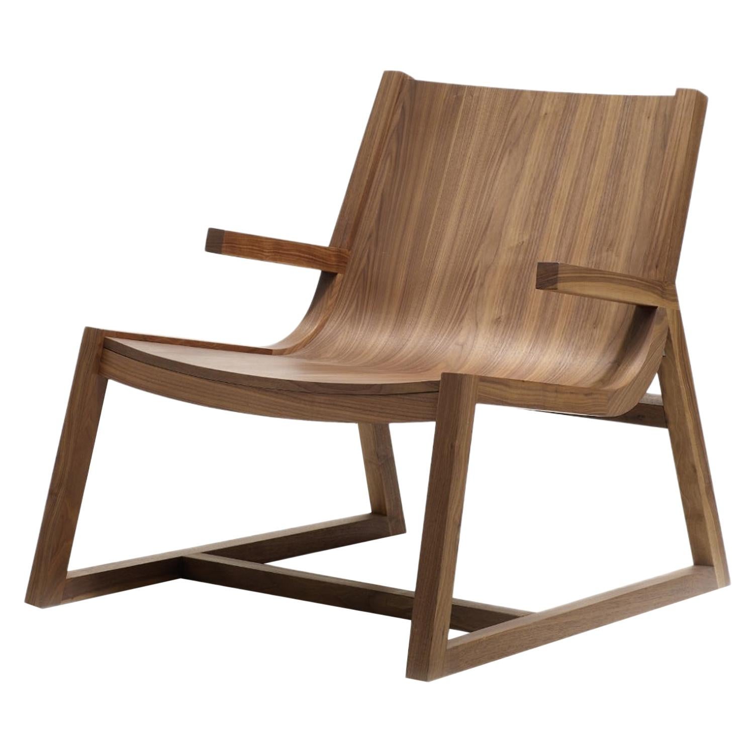 Umber Modern Low Armchair in Walnut Wood with Crafted Arm Detail For Sale
