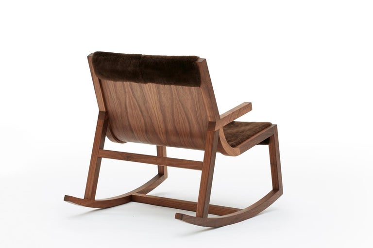 The Umber Rocker is the Rocking chair version of our iconic umber chair. The Umber Rocker is a comfortable Modern walnut rocking armchair with a crafted arm detail. Designed to sit comfortably in its own space, the Umber Rocker offers a low,