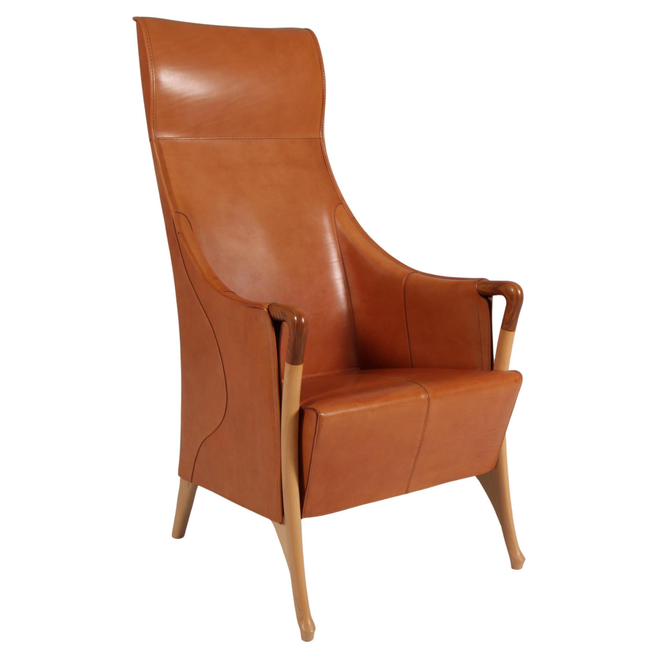 Umberto Asnago for Giorgetti lounge chair in saddle leather For Sale