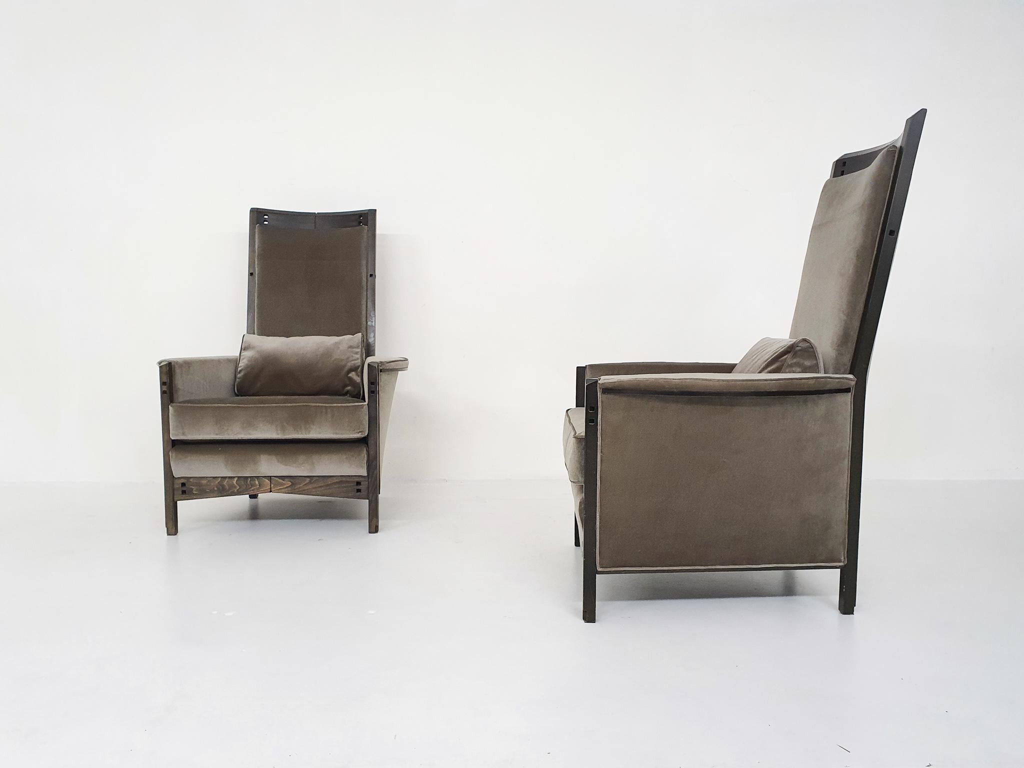 A pair of impressive lounge chairs with a “throne like” appearance, designed by Umberto Asnago for Giorgetti in the 1990’s.
The chairs are made of a wooden frame and new taupe velvet upholstery.