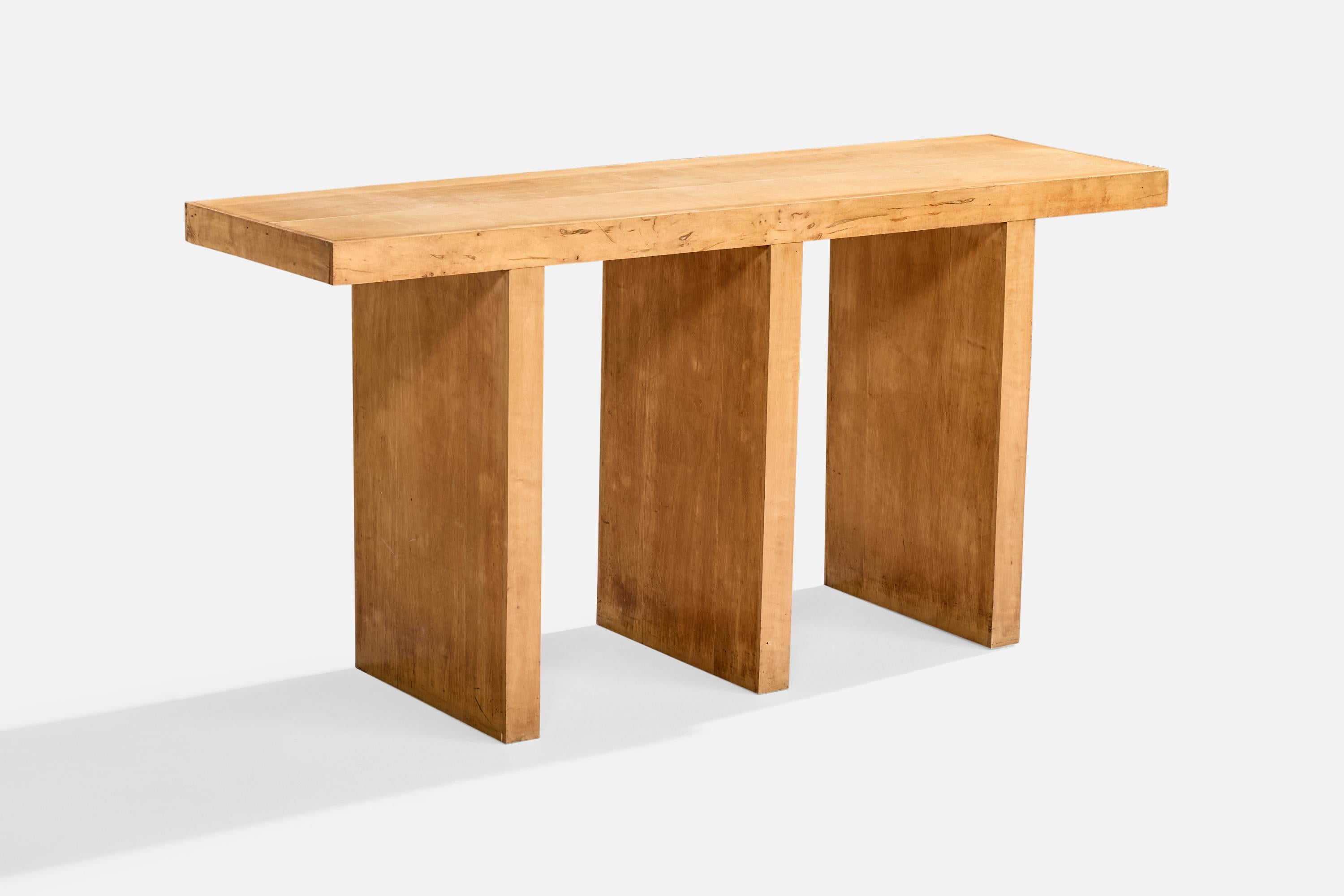 A maple console table produced by Umberto Brichetto, Genova, Italy, c. 1930s.

Overall Dimensions (inches): 29.75