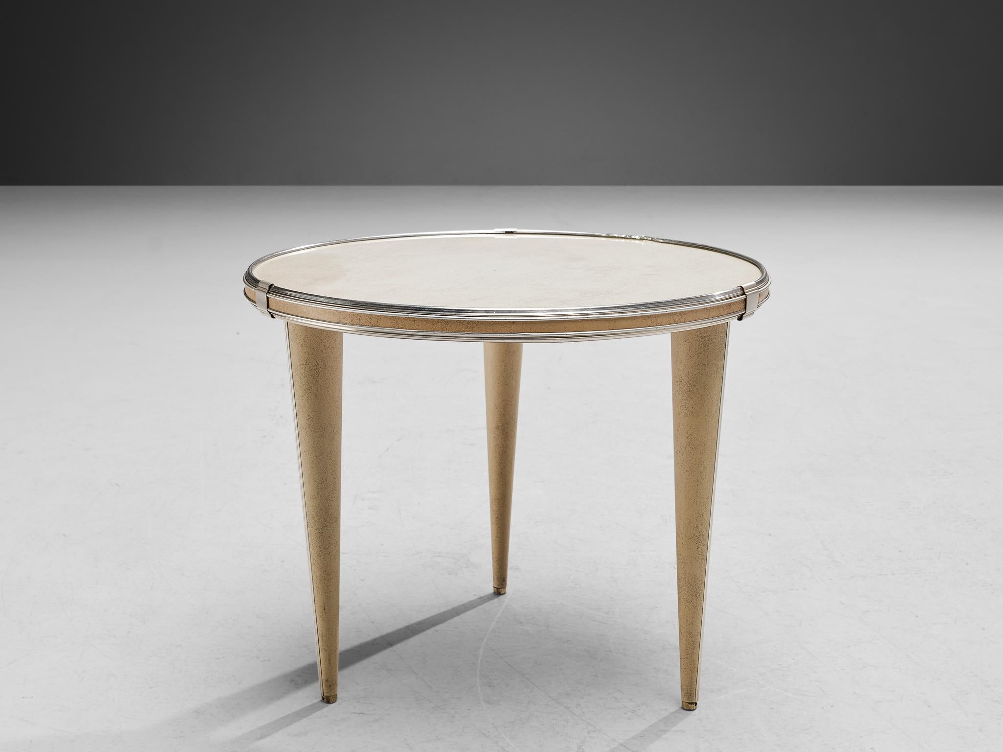 Umberto Mascagni, coffee table, vinyl, brass, chrome-plated aluminum, Italy, circa. 1960

Charming coffee table that originates from Italy, featuring clear shapes and an interesting combination of materials. The tabletop and legs are executed in an