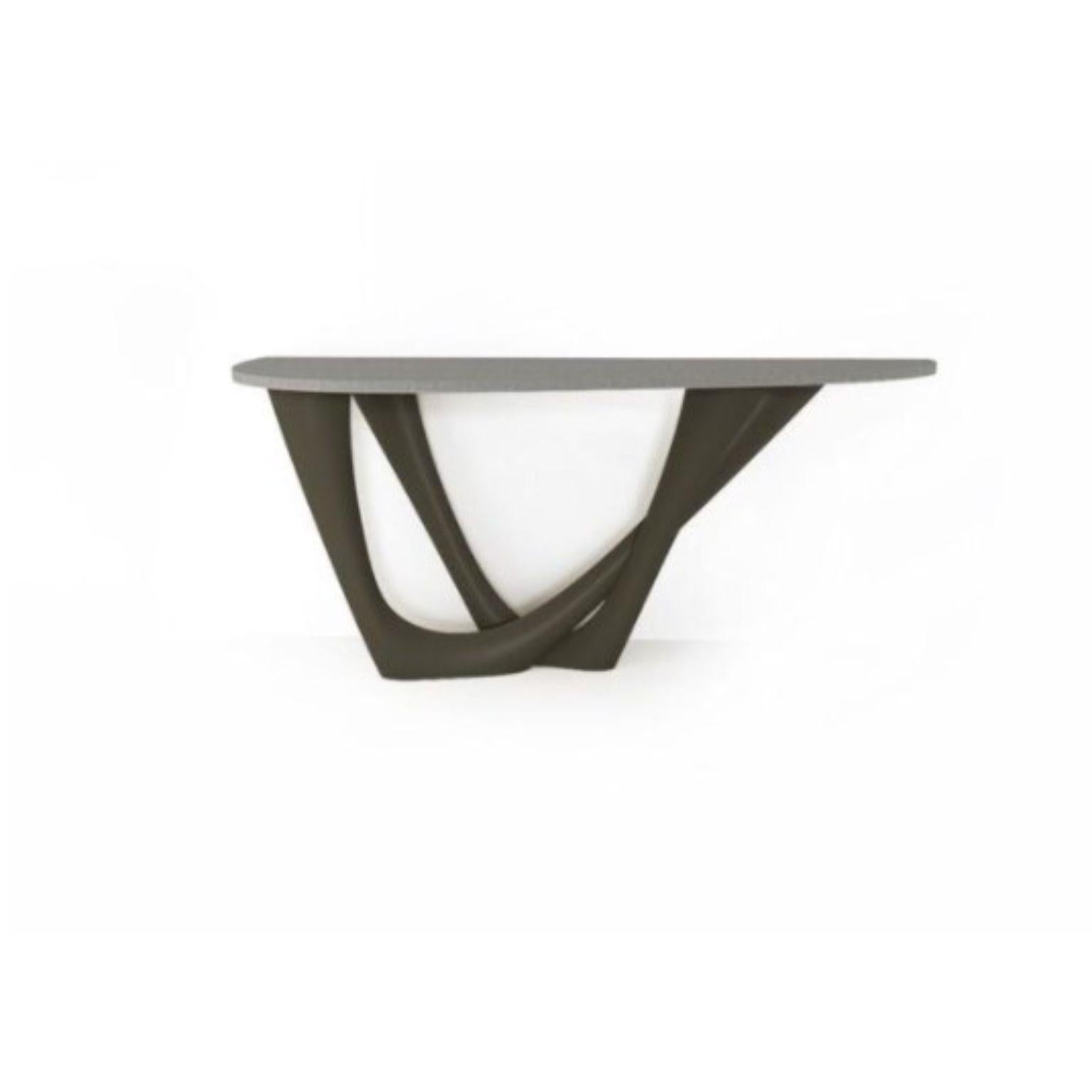 Umbra Grey G-Console Duo concrete top and steel base by Zieta
Dimensions: D 56 x W 168 x H 75 cm 
Material: Carbon steel, concrete.
Also available in different colors and dimensions.

G-Console is another bionic object in our collection. Created for
