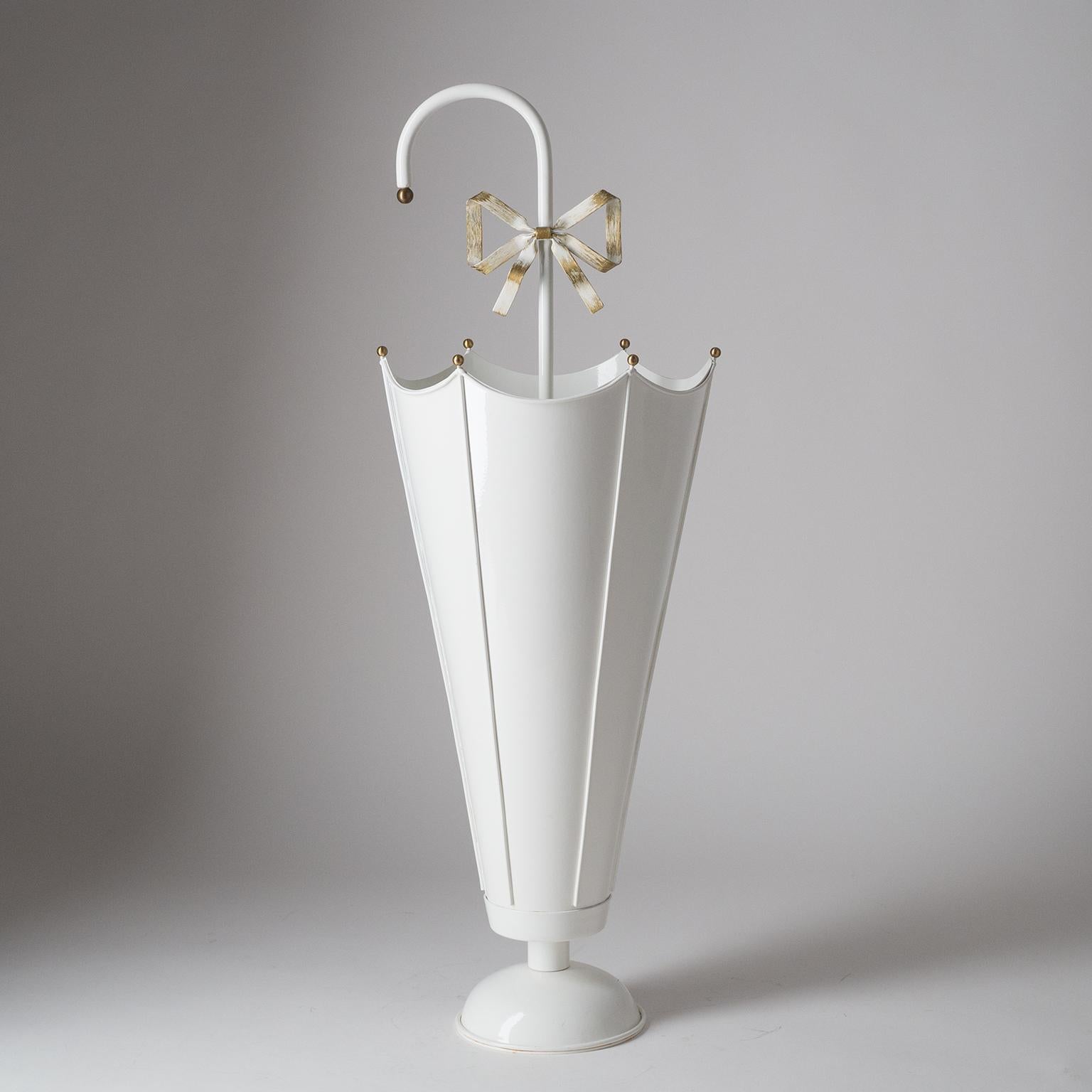 Lovely umbrella stand from the 1950s. White lacquered body with brass details in very good original condition.