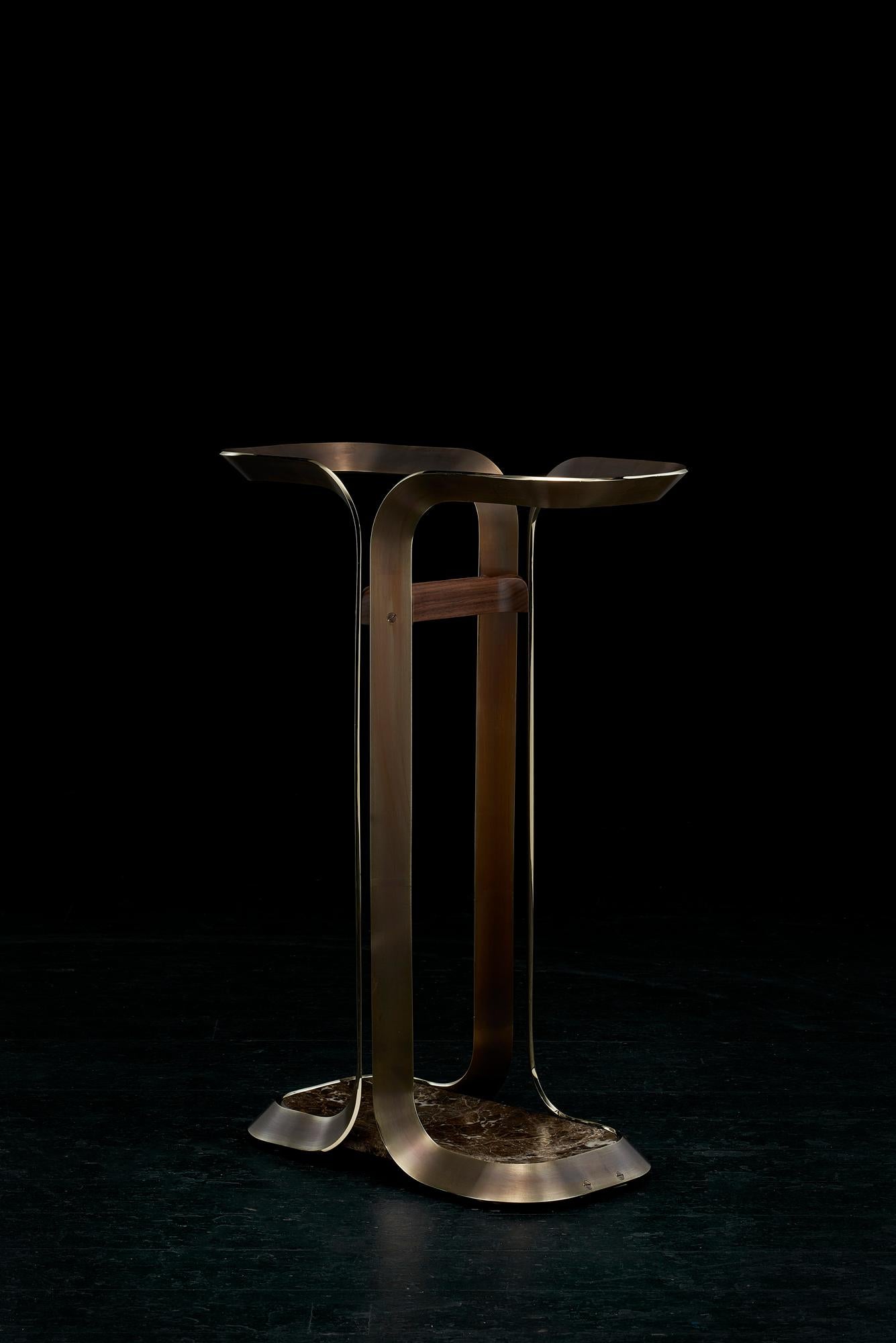 The Honorific umbrella stand is hand crafted in brushed and patinated solid brass with polished edges. 

The two tone finish adds depth to the material and beautifully reflects your foyer or vestibule.

The brass here, as in all our products, is