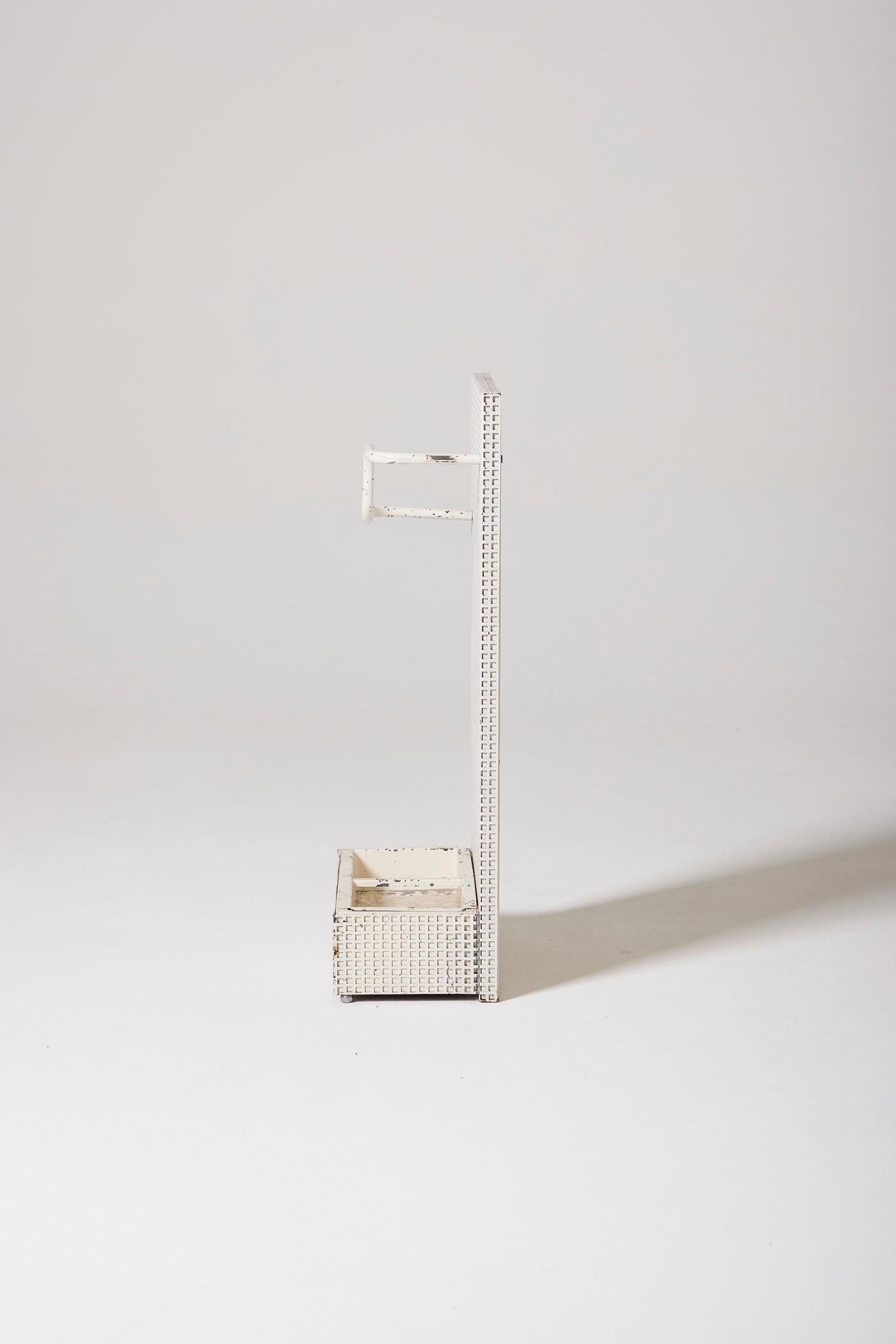 Umbrella Stand by designer Tjerk Reijenga for Pilastro, 1960s. It is in perforated white metal in the style of designer Josef Hoffmann. Time-worn patina.
DV457