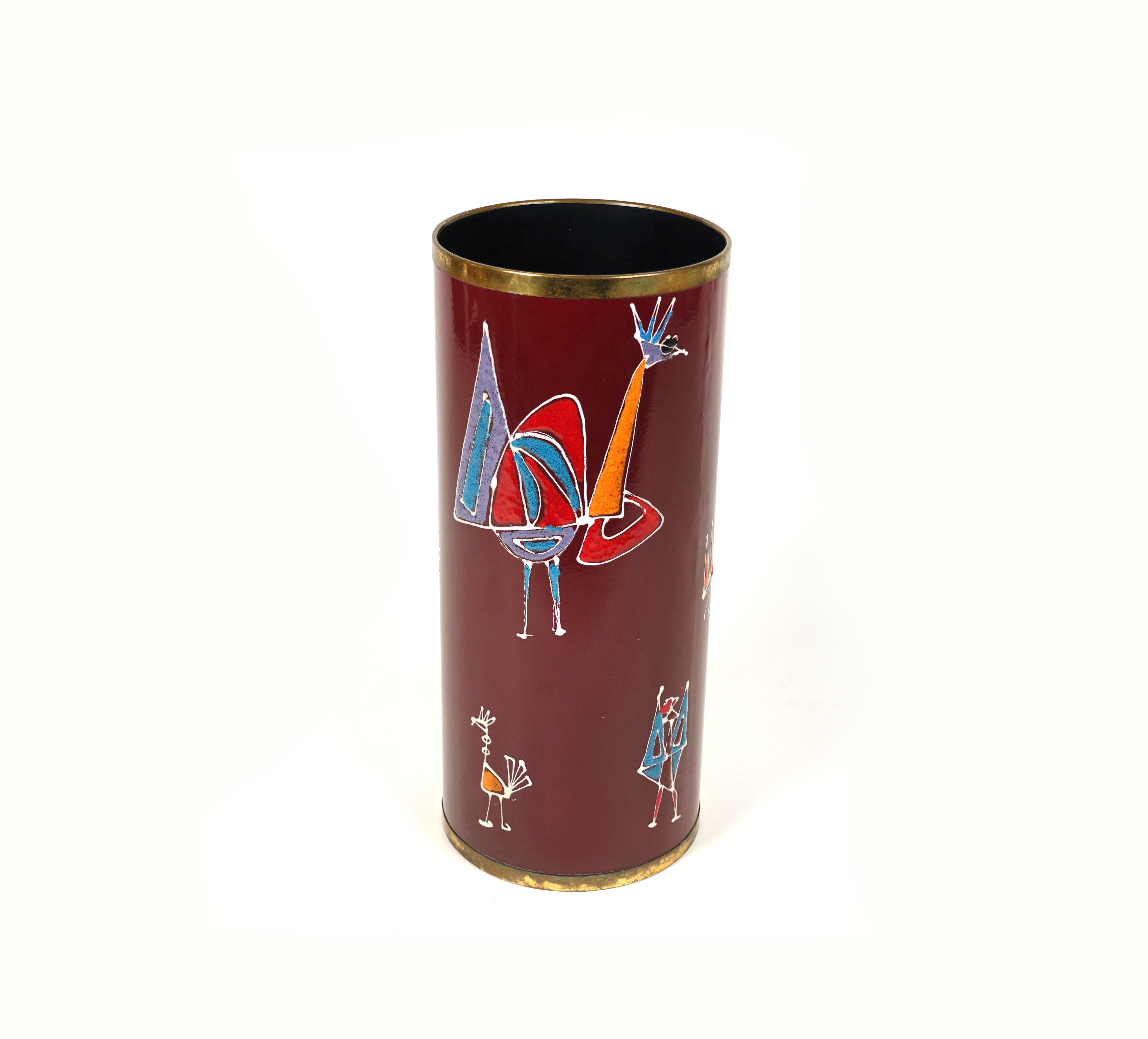 Midcentury umbrella stand in enamel iron and painted with brass details by S.I.V.A. di Poggibonsi.

Made in Italy in the 1960s.

S.I.V.A., a factory of artistic enamels on steel, was founded in 1953 by the painter and sculptor Giuseppe Calonaci,