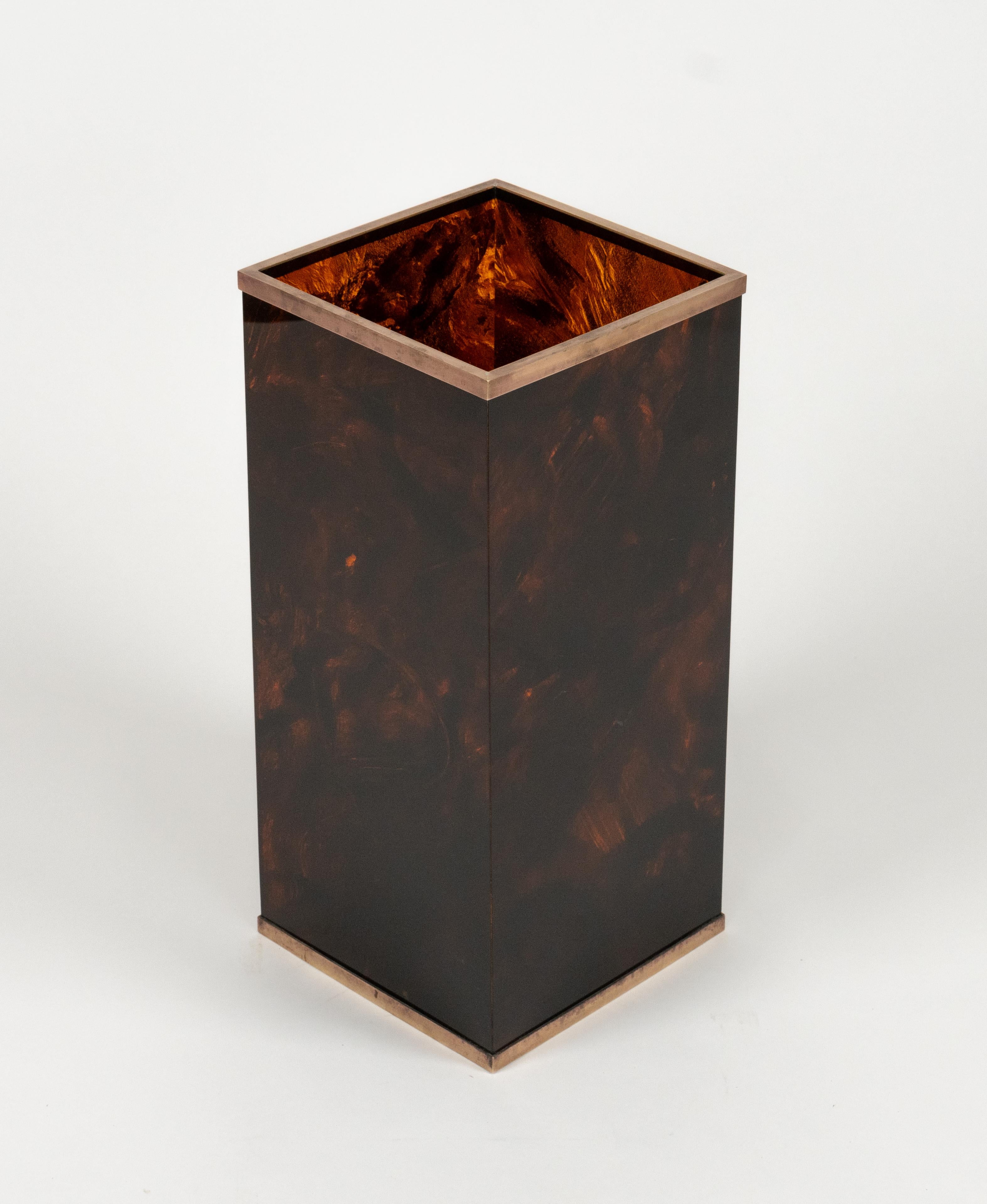 Midcentury amazing umbrella stand in tortoiseshell Lucite effect and brass details in the style of Christian Dior Home.   

Made in Italy in the 1970s.