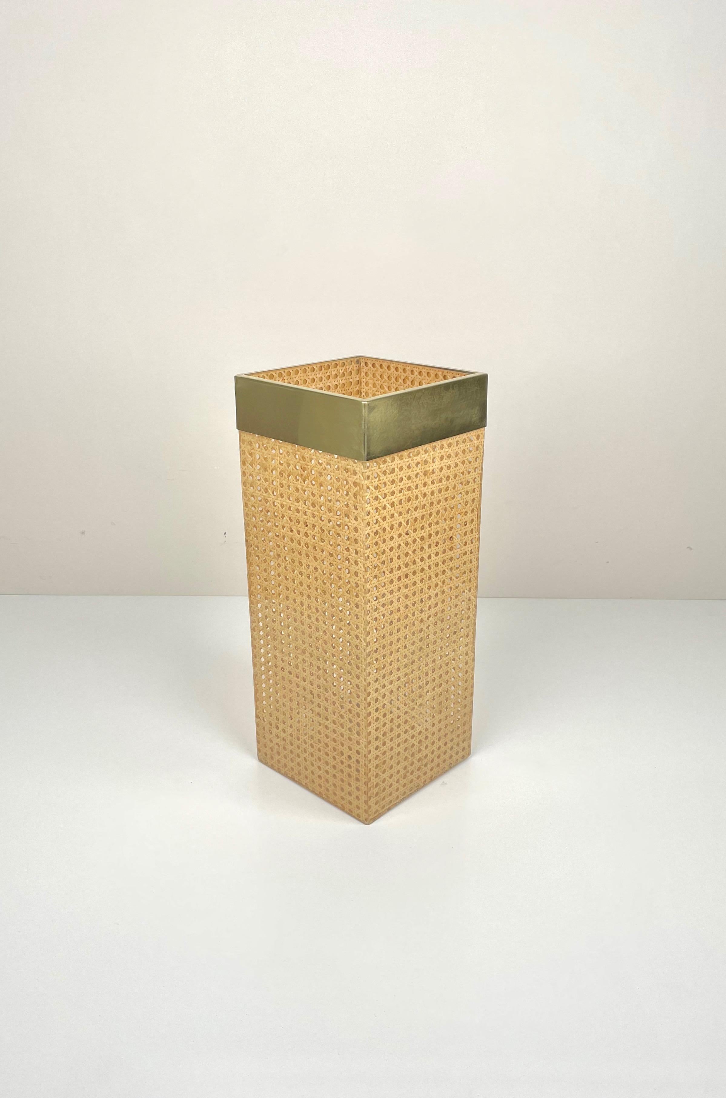Rectangular umbrella stand in Lucite rattan and brass details by Christian Dior Home. A rare French piece from the 1970s.