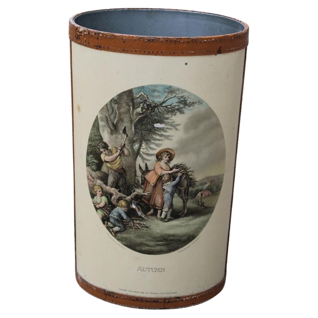 Umbrella stand with prints of 1950s country English life with leather parts