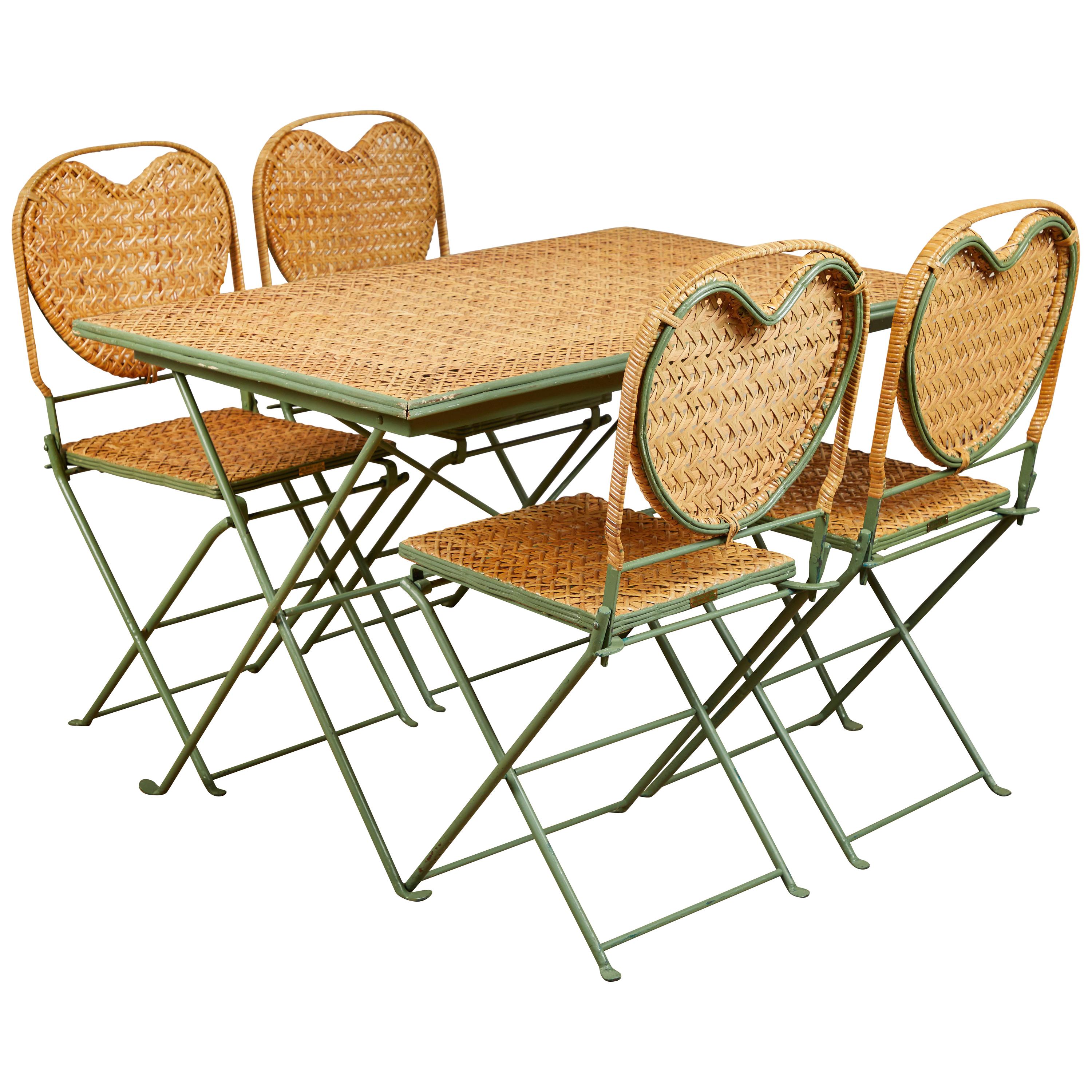 "Un Jardin en Plus" Metal and Cane Table and Chairs For Sale