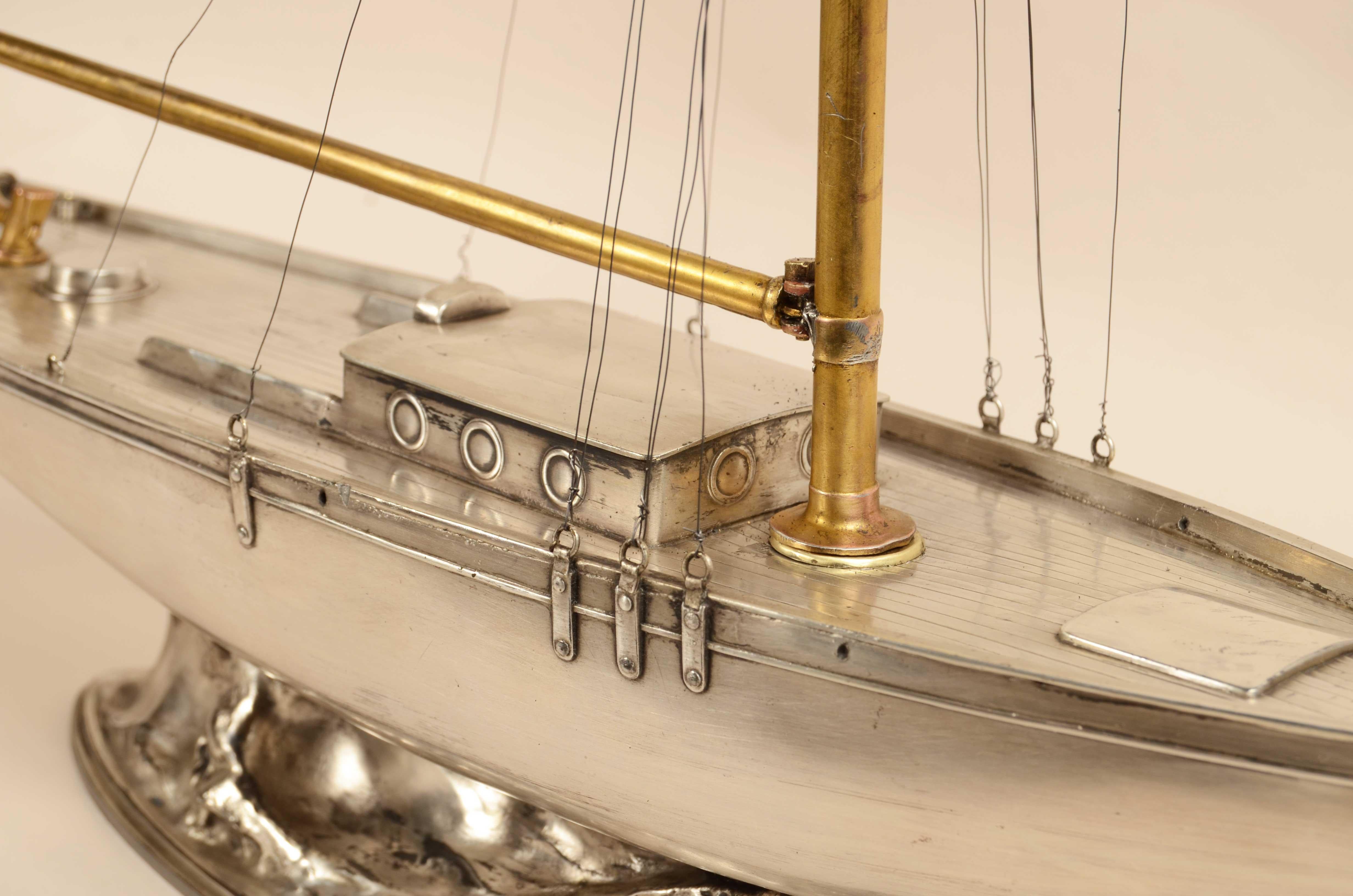 A fine early 20th century model of a white metal Cutter 5