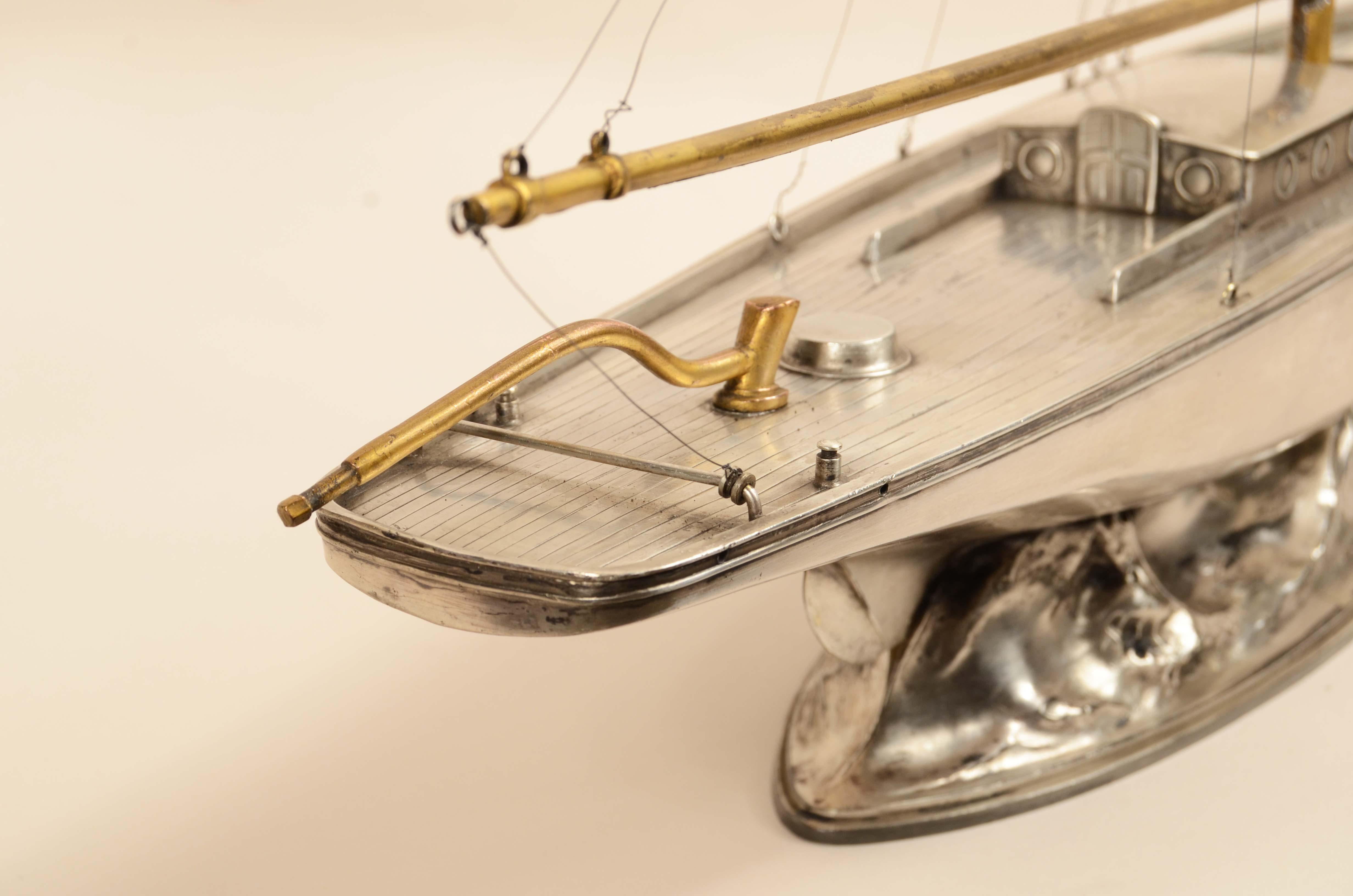 A fine early 20th century model of a white metal Cutter 6