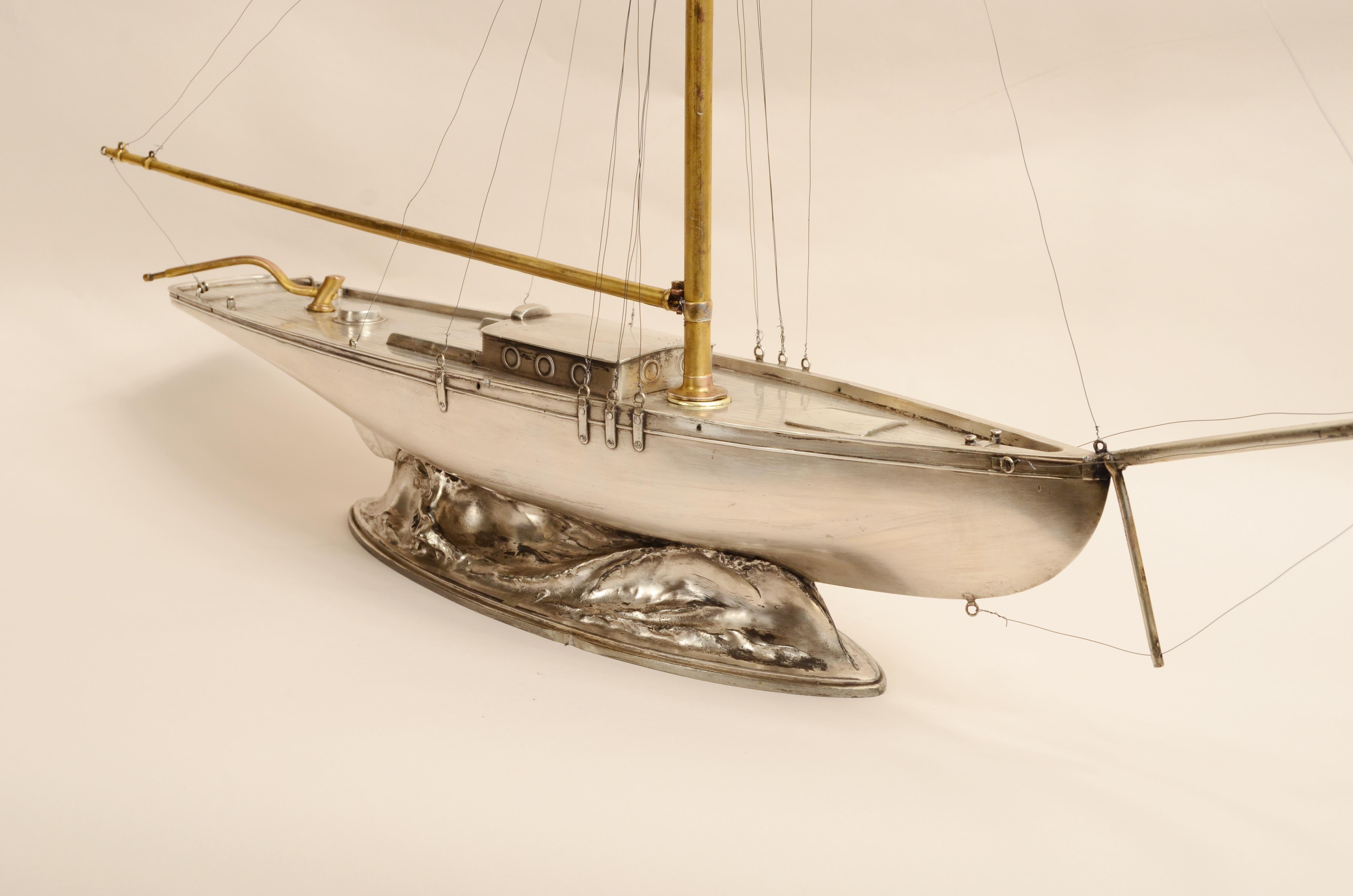 A fine early 20th century model of a white metal Cutter 7