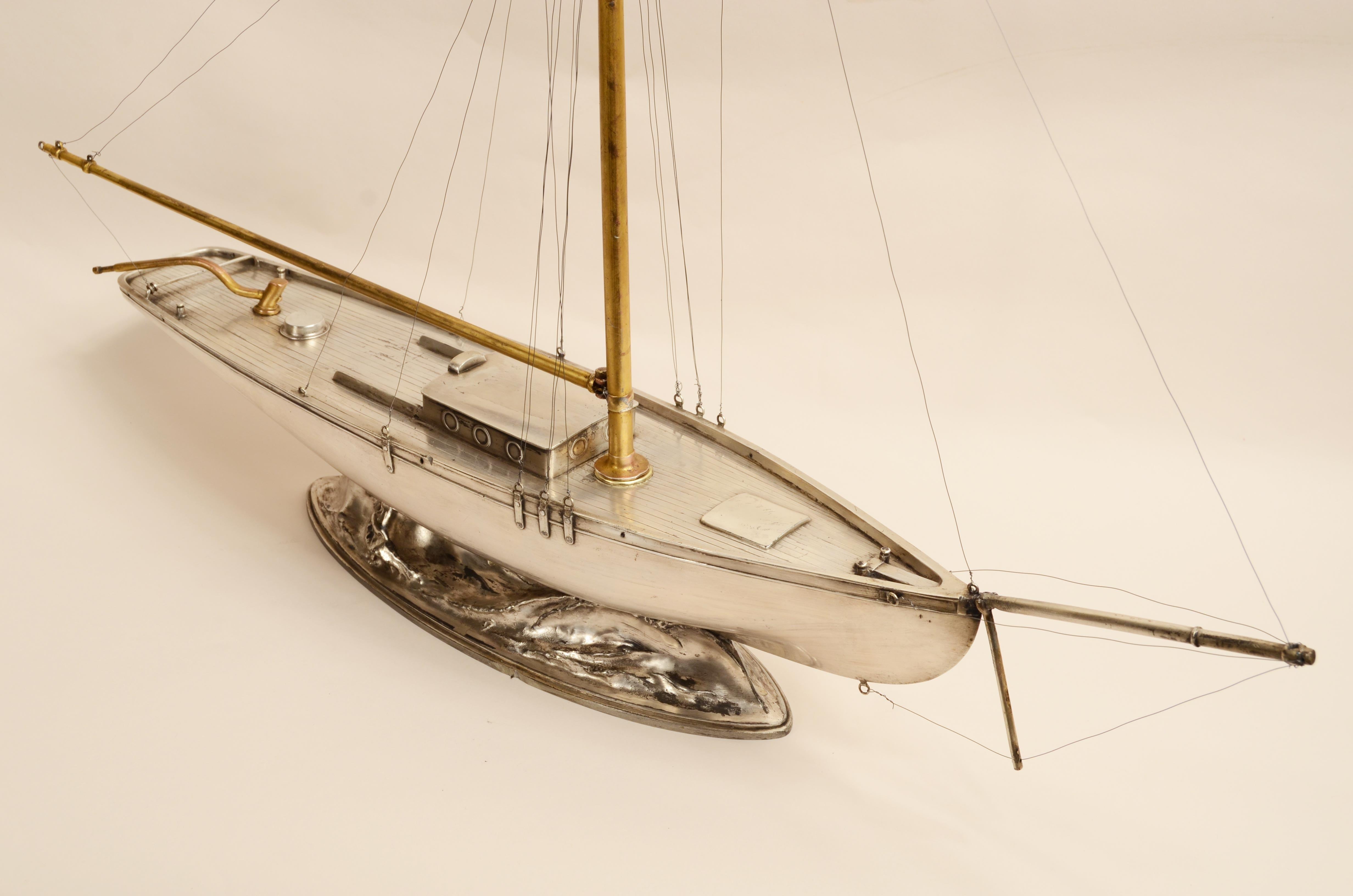 A fine early 20th century model of a white metal Cutter 8