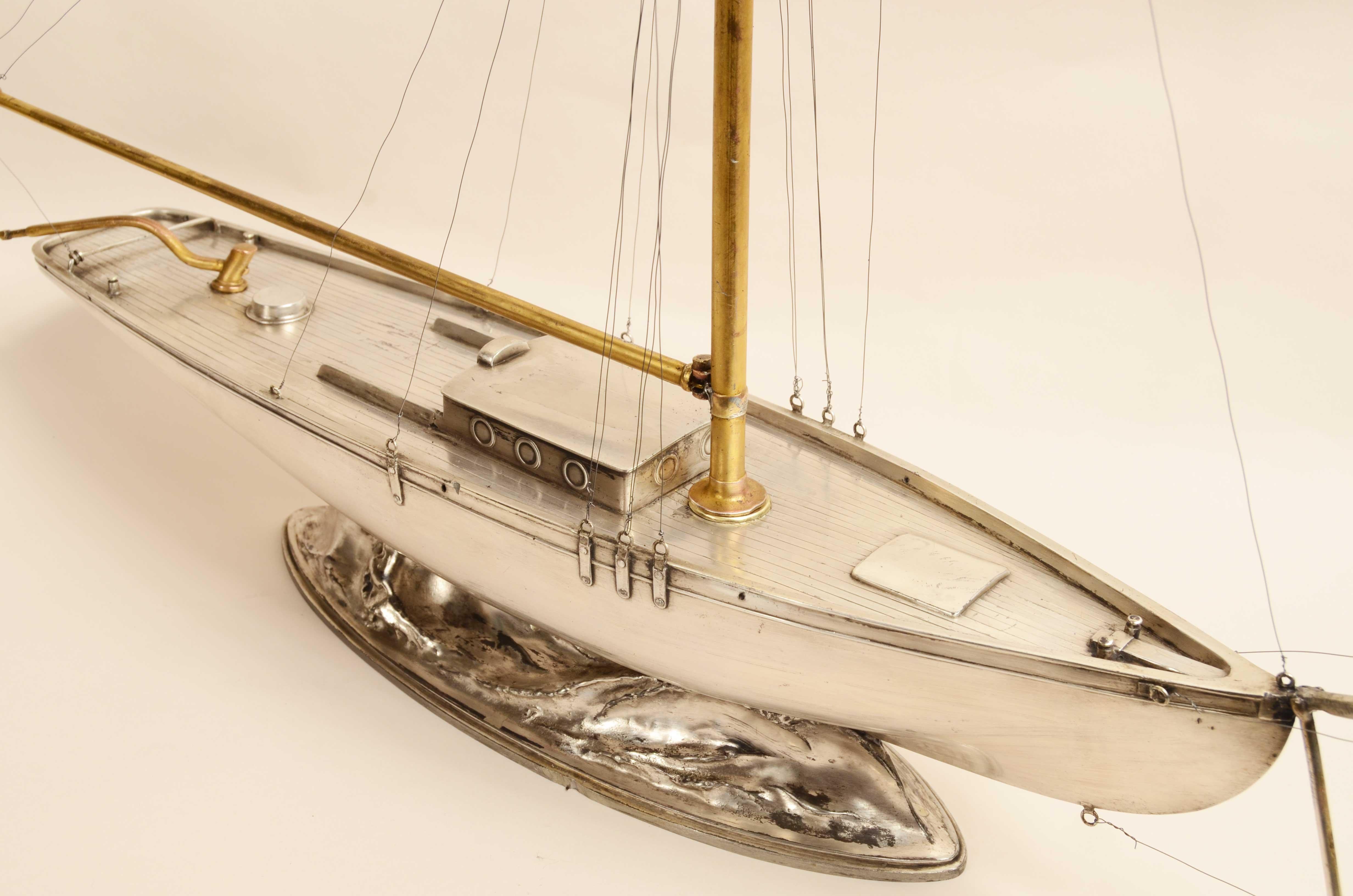 A fine early 20th century model of a white metal Cutter 9