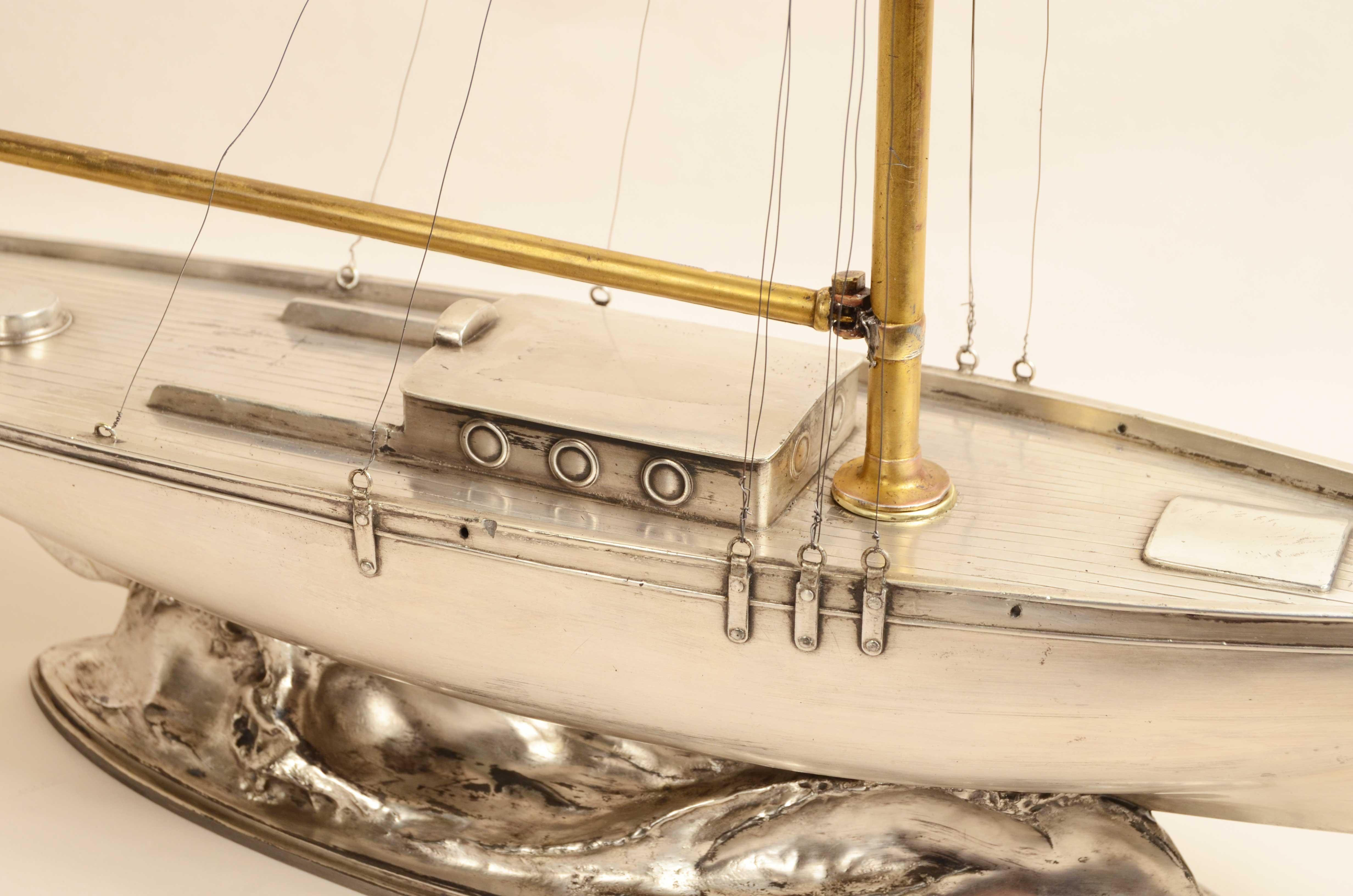 A fine early 20th century model of a white metal Cutter 10