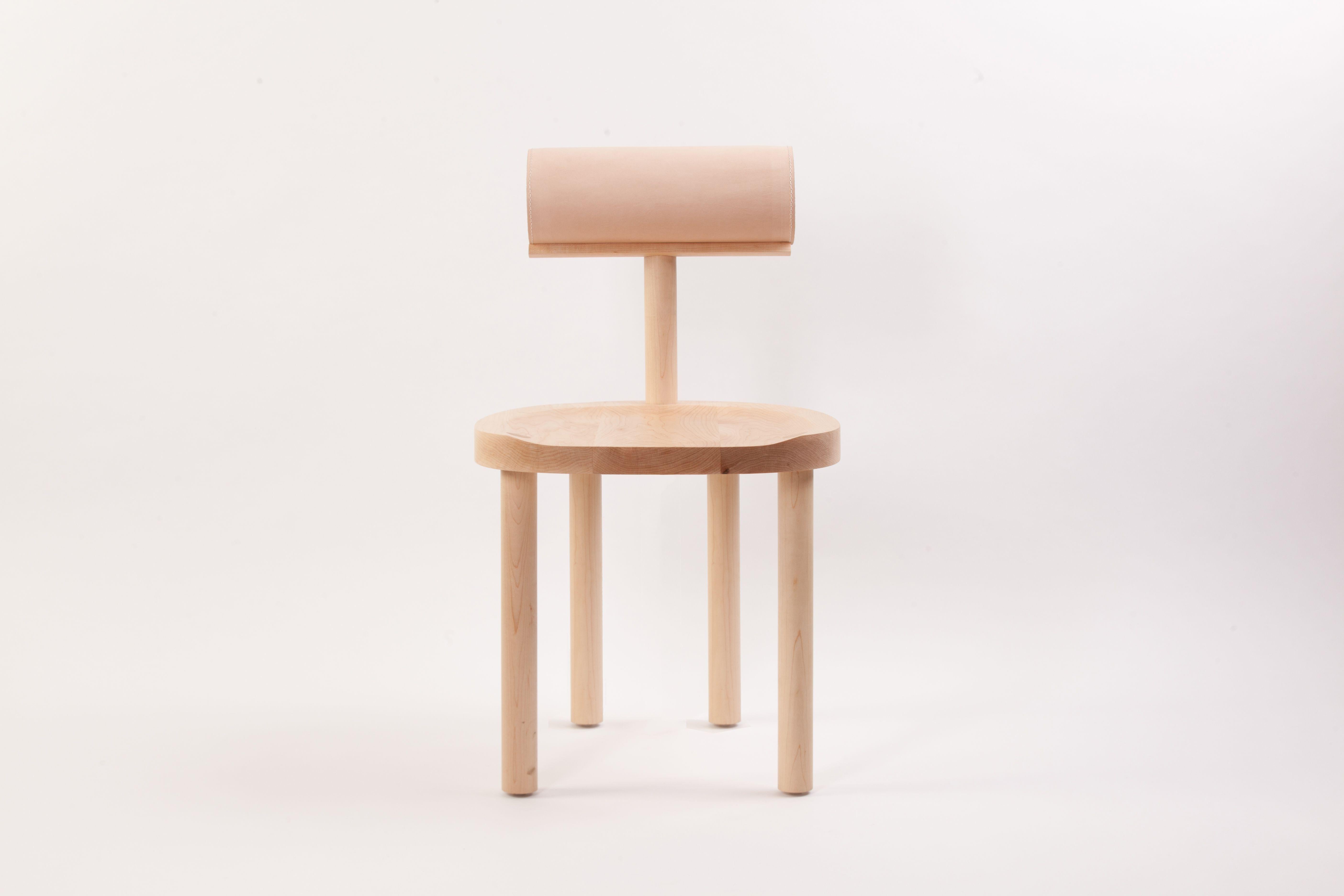 Una Maple chair by Estudio Persona
Dimensions: W 45.7 x D 48.3 x H 78.8 cm
Materials: Solid maple, natural vegetable leather

Solid maple, upholstered back bolster in natural vegetable leather.

Also available in solid ash ans black natural