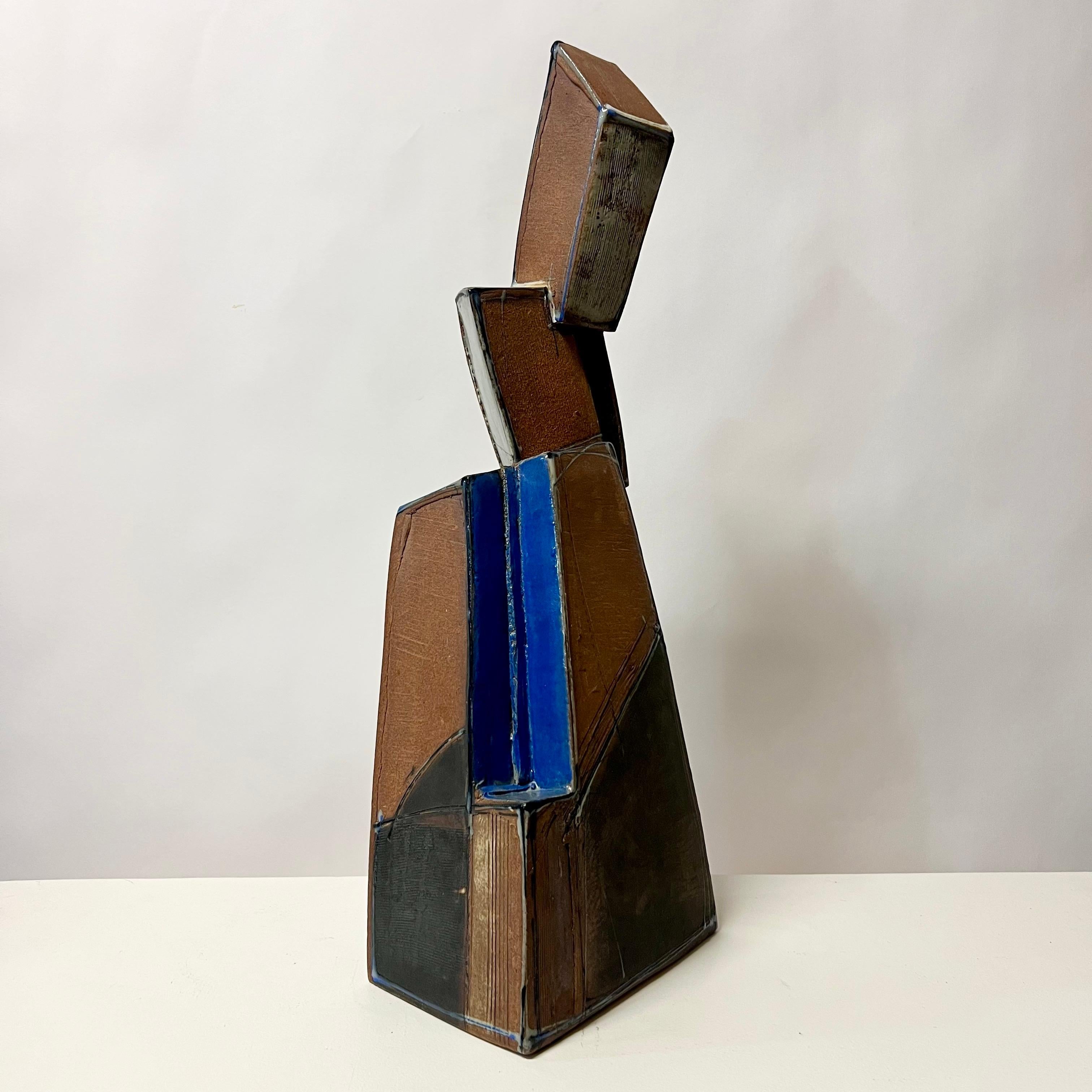 Incredible geometric ceramics slab sculpture by well accomplished artist, Una Mjurka. Incredibly well executed piece. 

Una Mjurka was born in Riga, Latvia. She received an Artist Expert degree from Riga Applied Arts School and a BA in Ceramics from