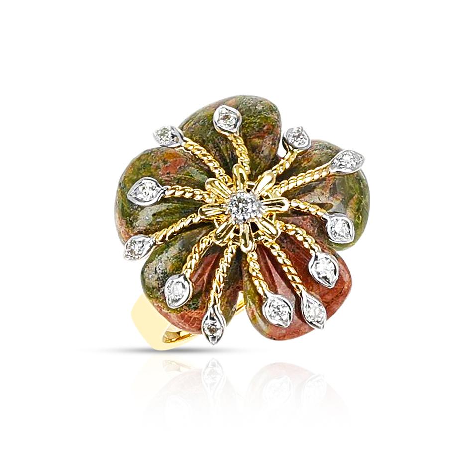 A Unakite Carved Floral Ring with 14k Goldwork and Diamonds. The Unakite is 9.45 carats and the Diamonds weigh 0.14 carats. The total weight of the ring is 4.70 grams. The ring size is US 6. 