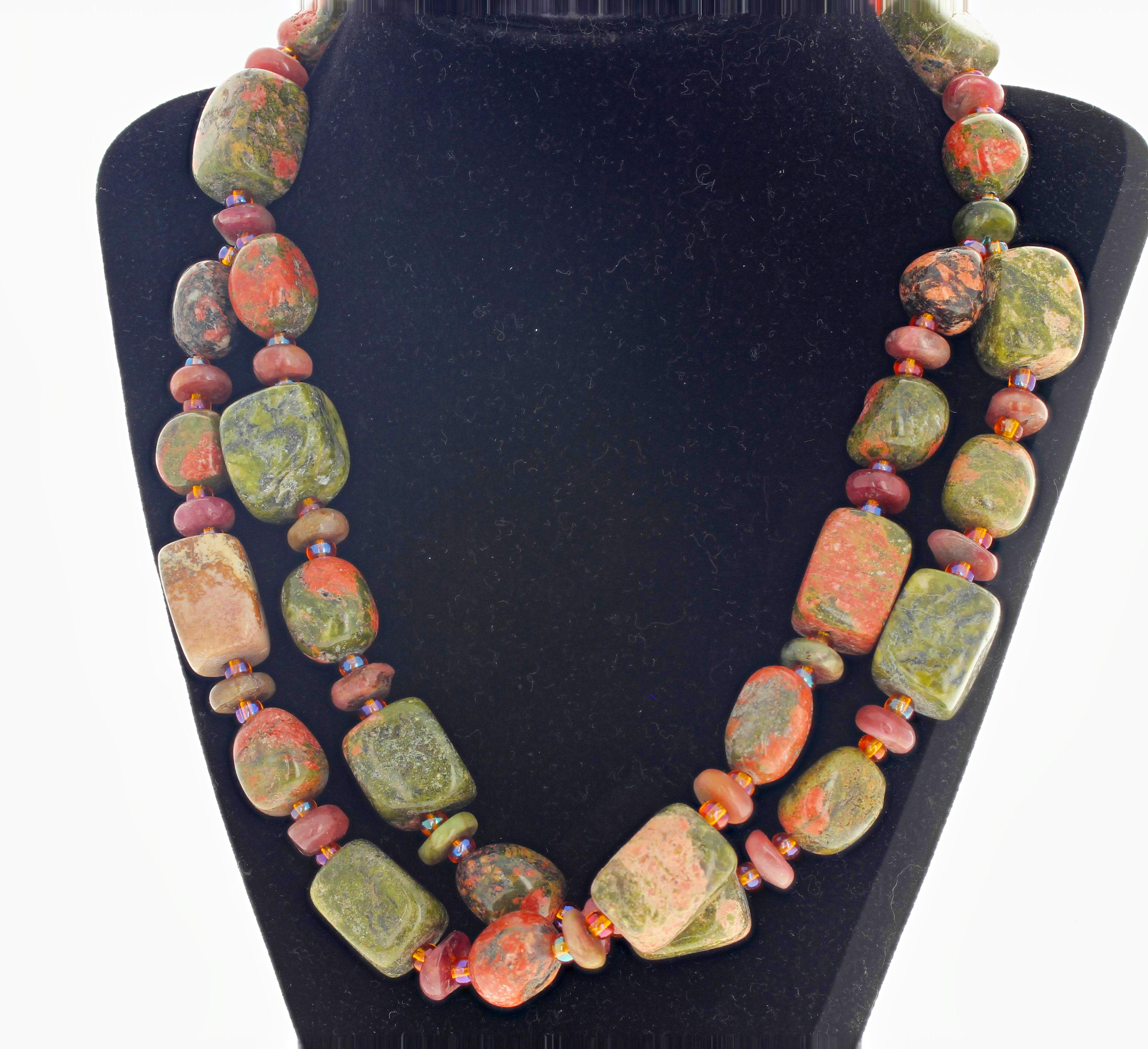 Highly polished glowing Unakite Jasper enhanced with polished rondels of pnky Tourmaline sits elegantly on your neck with an easy to use hook clasp.  The necklace is 19.5 inches long and the largest Jasper is approximately 20 mm x 15 mm.  Unakite