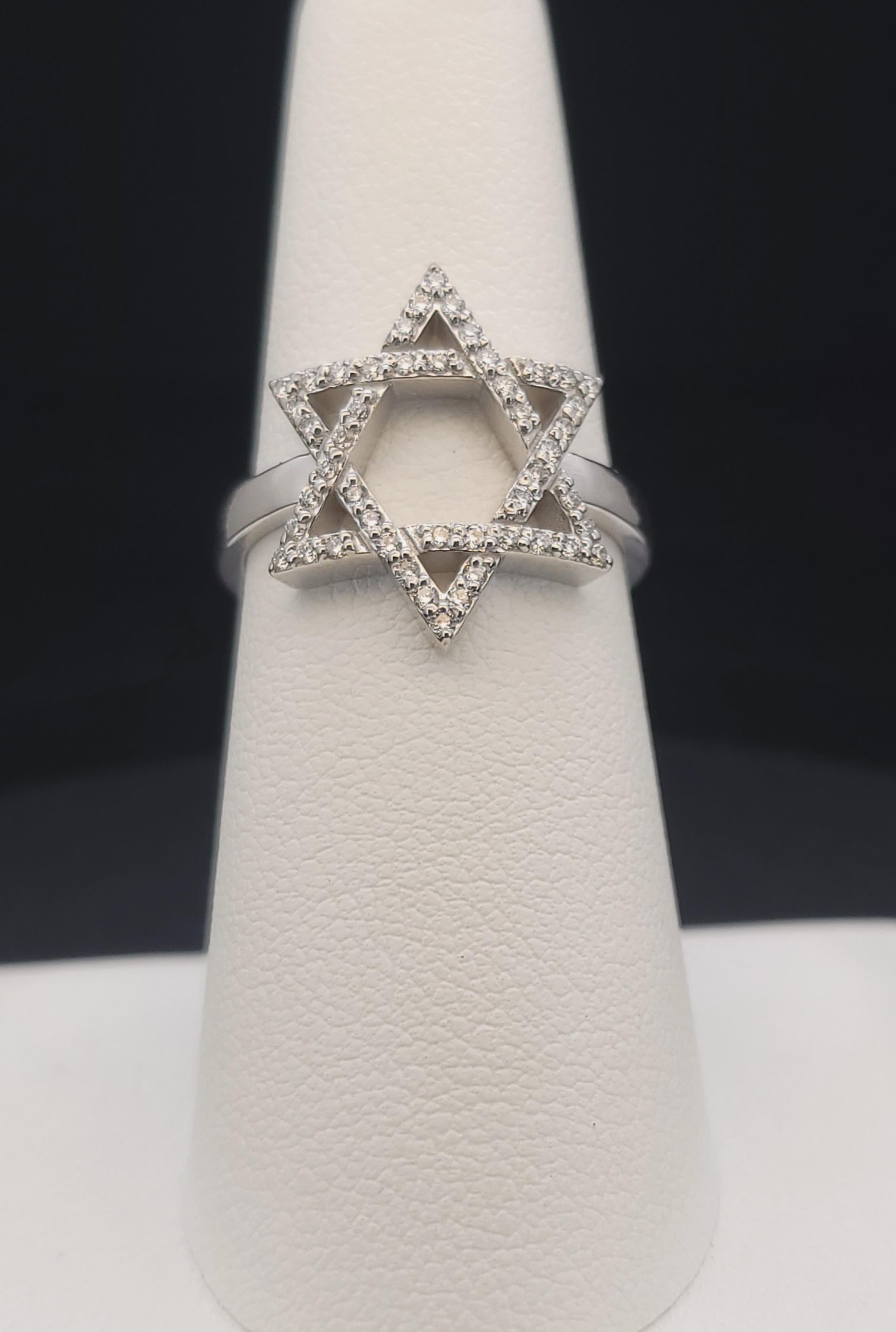 Unbranded Ring with Diamonds 
Material 14K White Gold 
Diamonds .65ct 
Diamond Clarity VS
Color Grade G
Ring Size 6.75
Ring Weight 4.5gr
Condition New, never worn 
Retail Price: $ 1,950
This ring can be resized    