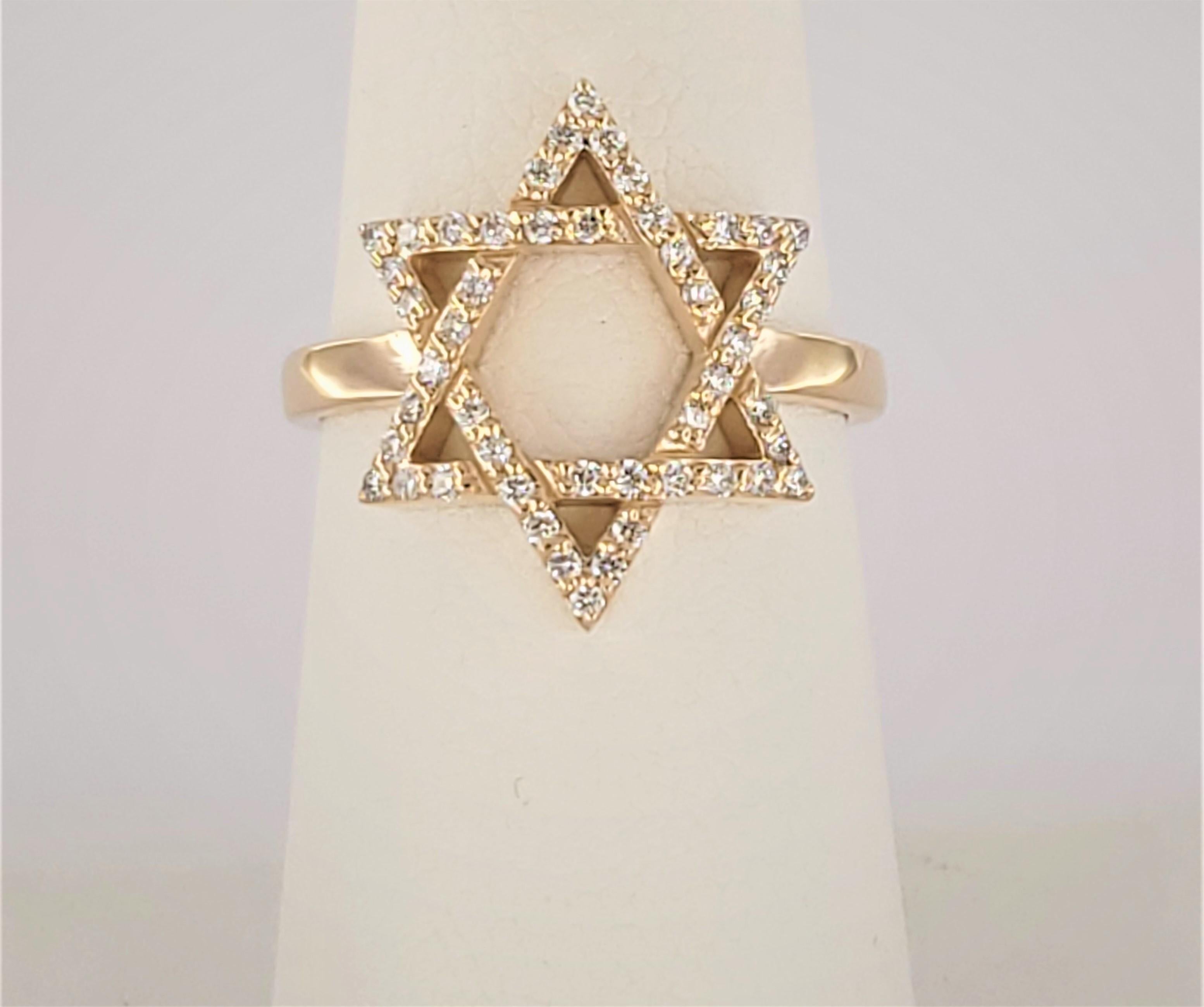 Unbranded Ring with Diamonds 
Material 14K yellow Gold 
Diamonds .65ct 
Diamond Clarity VS
Color Grade G
Ring Size 7
Ring Weight 4.2gr
Condition New, never worn
Ring can be resized
Retail Price $1,950