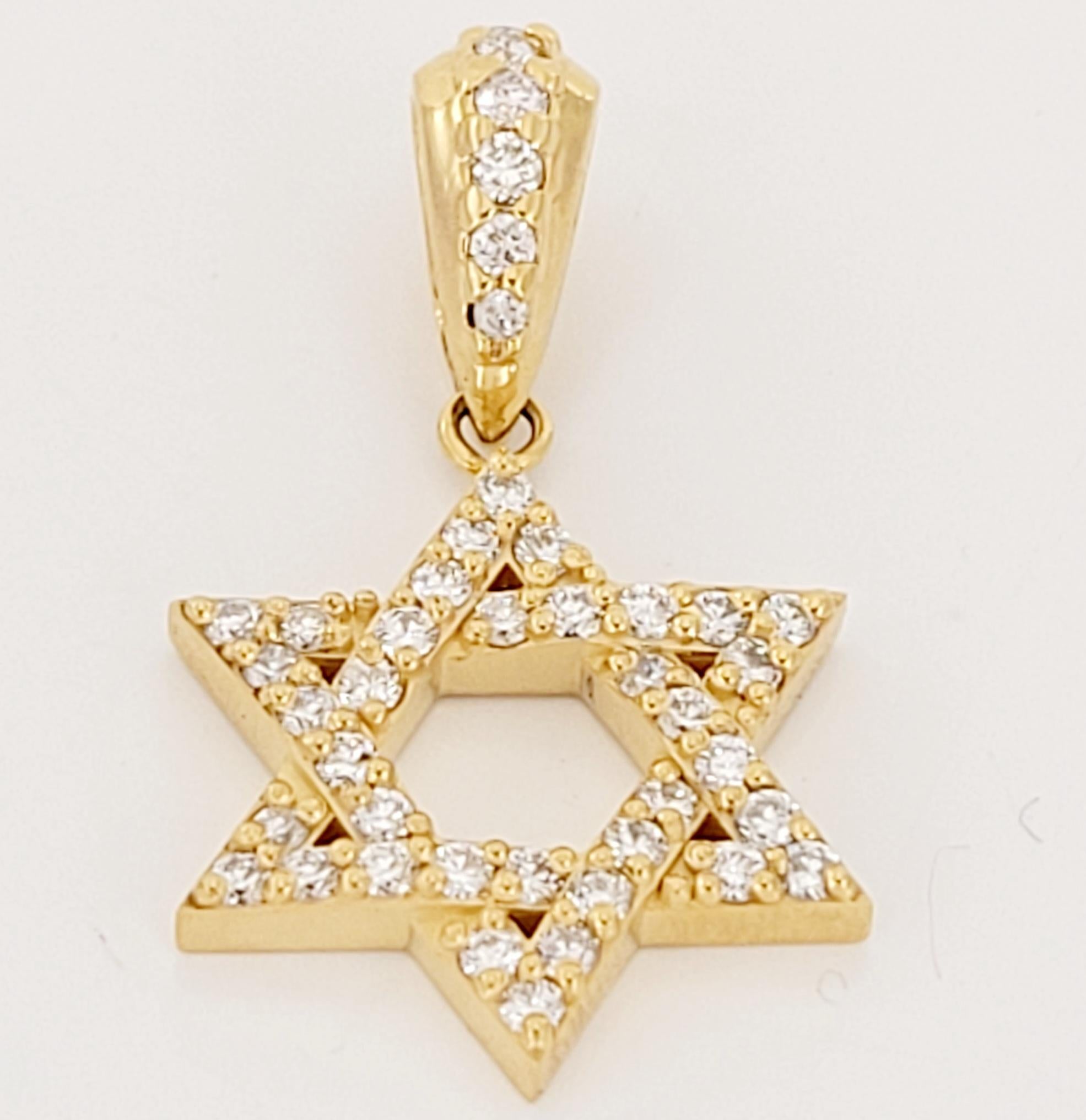 Unbranded Pendant with Bail
Material 14K Yellow gold
Pendant width 20.7mm
Length with bail 32mm
Diamonds .90ct
Diamond Clarity VS
Color Grade G
Condition New, without tags
Retail Price$ 1950