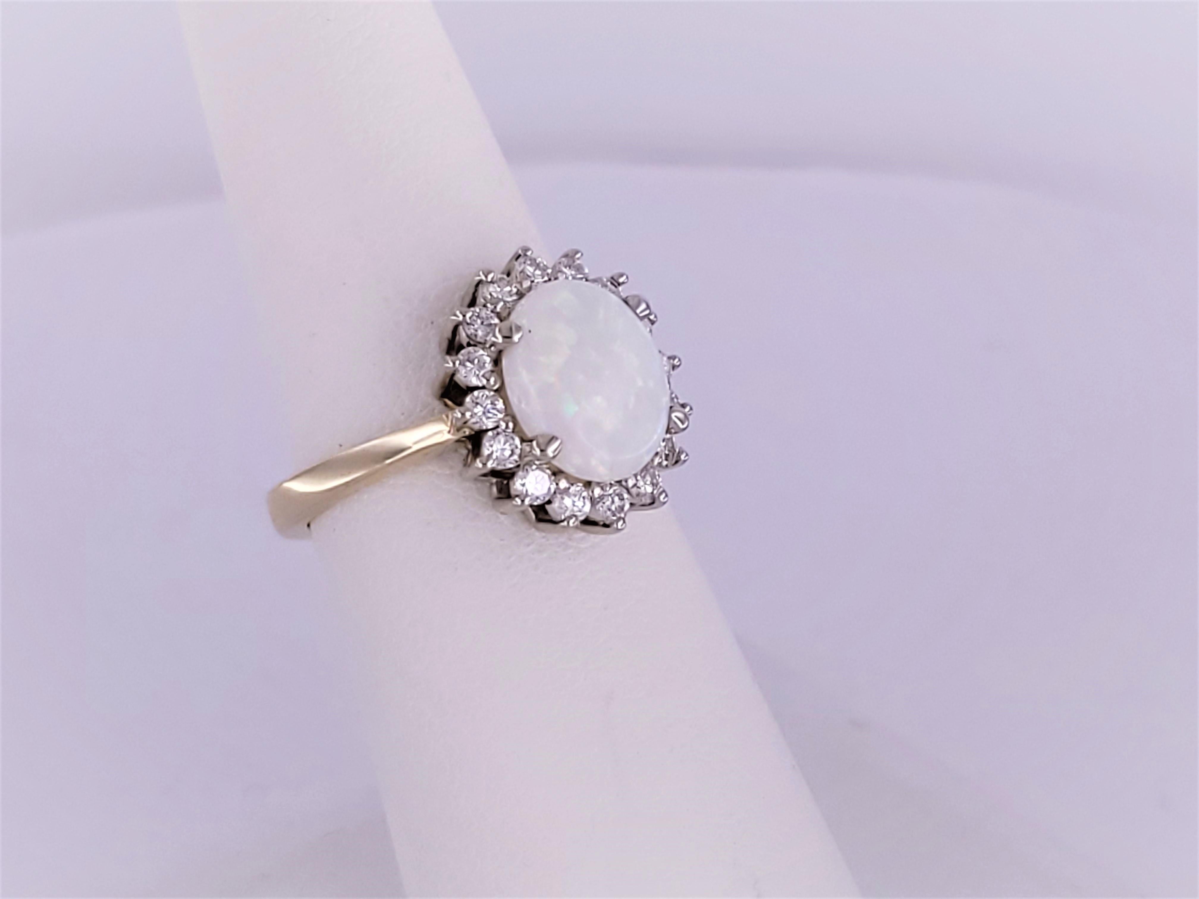 Oval Cut Unbranded Opal Ring with diamonds in 14K Gold For Sale