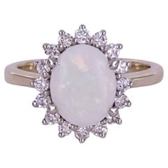 Anillo de ópalo sin marca con diamantes en oro de 14 quilates