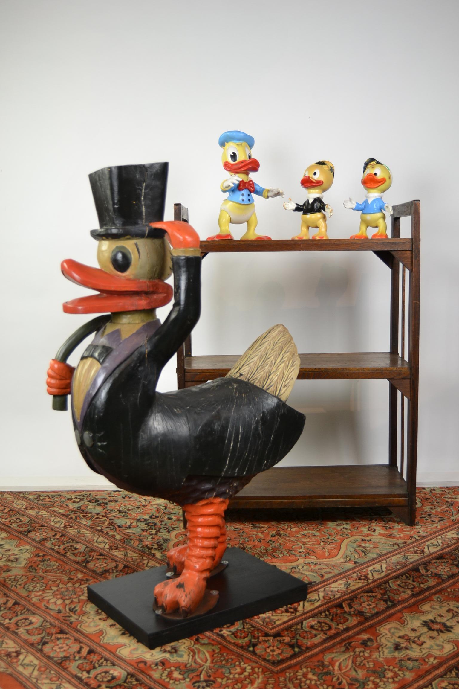 Uncle Scrooge Carousel figure.
This carved wood figural object was used on the Roundabout - Carousel and makes you smile.
He can be awesome in a child's room,
but does also fit well in your interior, entrance, hall, shop or office as he has