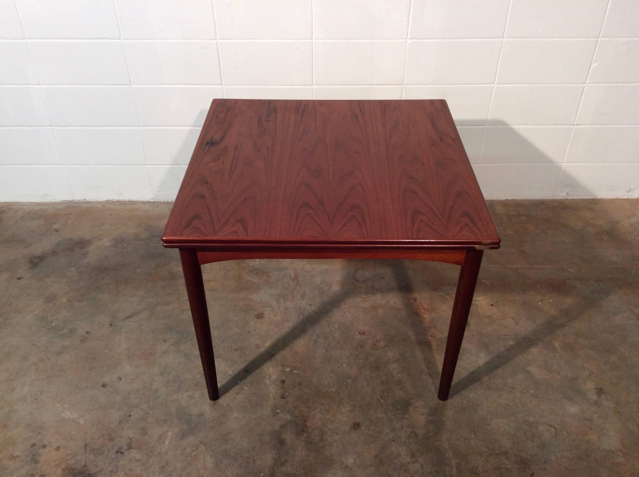 Uncommon Danish modern flip top dining or game table by Børge Mogensen for Soborg Mobelfabrik. High quality construction as with any of Børge Mogensen's designs. This table is very versatile as it could be a dining table, reduce to be a great gaming