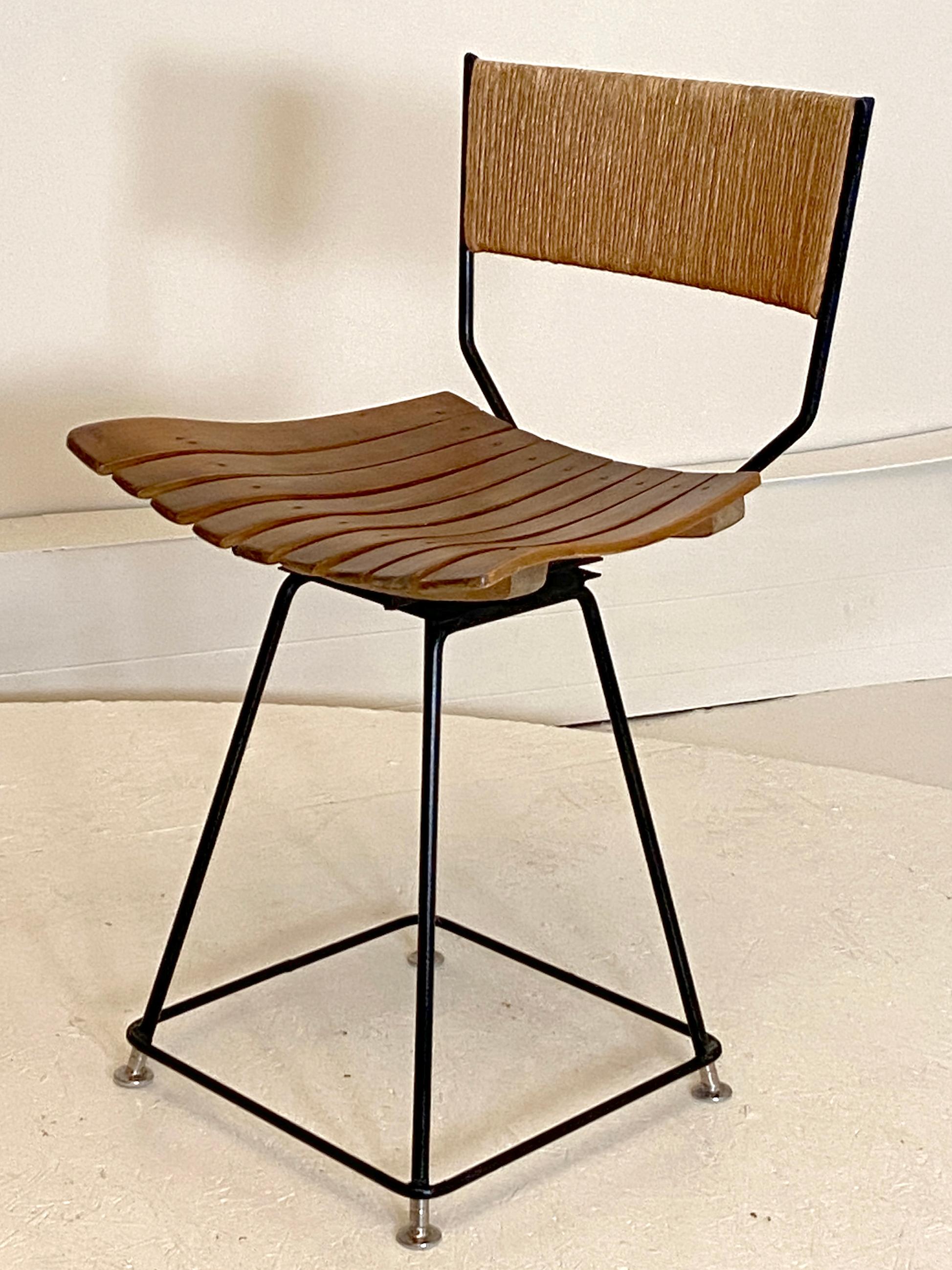 A very rare model from Arthur Umanoff. Special height chair believed to be used with his rush and birch desks he produced in the era. Note the stool seat height is 19-20