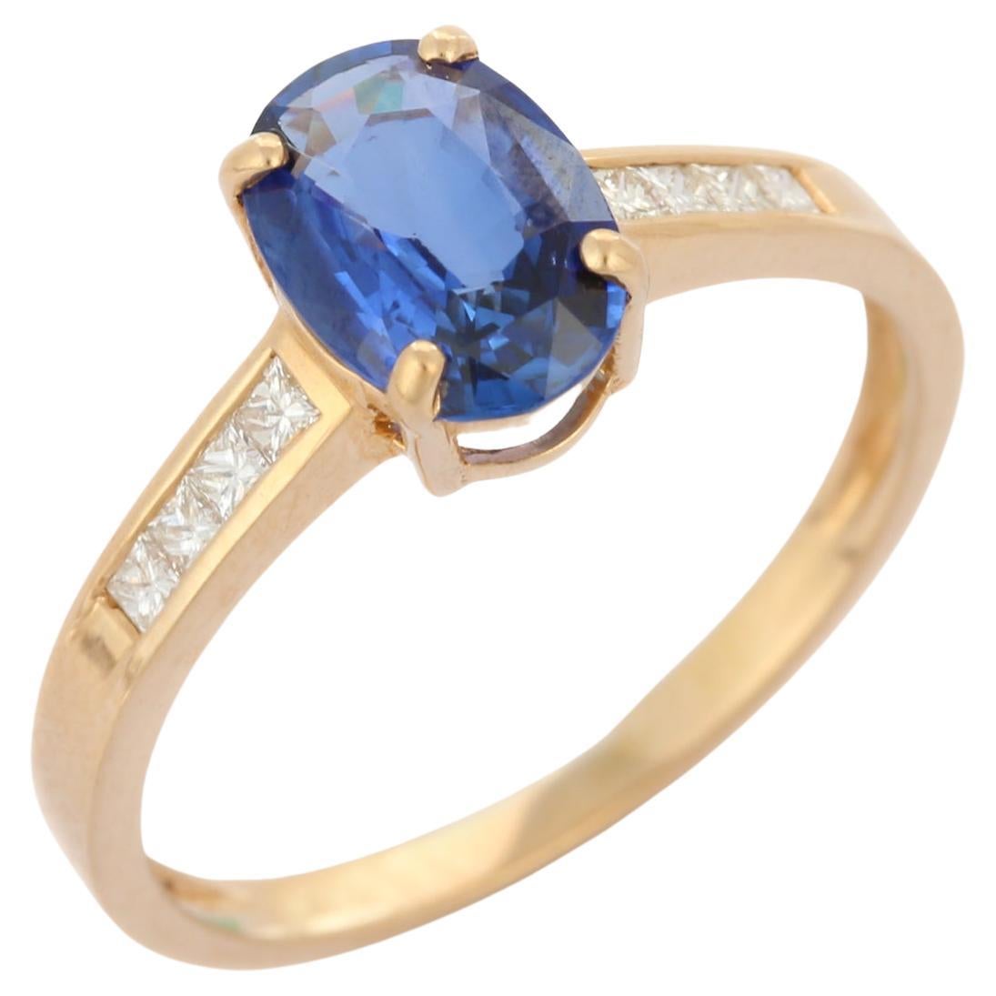Verlobungsring aus 14 Karat massivem Gelbgold mit Solitär und ovalem blauem Saphir und Diamant