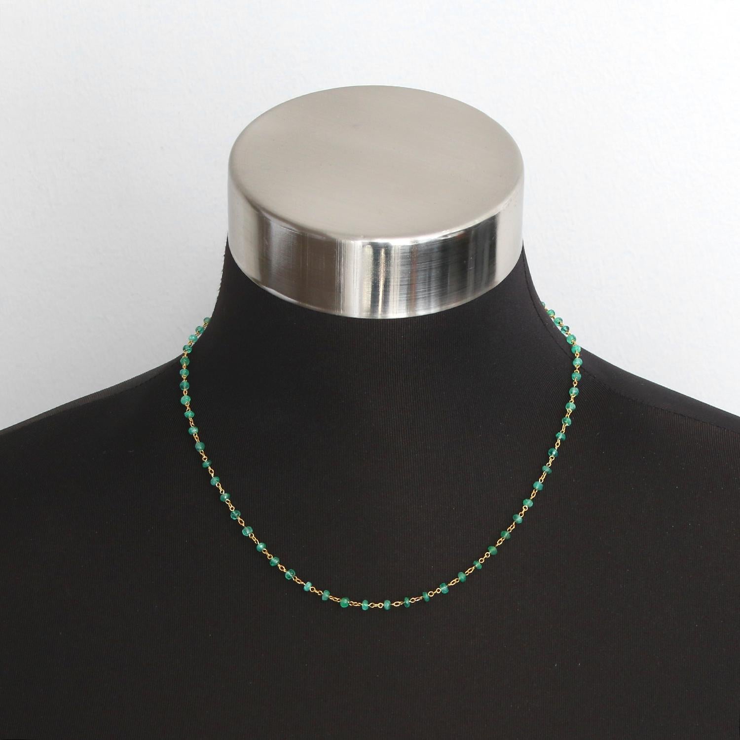 Uncut Emerald and Yellow Gold Necklace - Uncut emeralds on an 18k yellow gold necklace. Each emerald is roughly 3 mm in size. Measuring 17-18 inches long. Total sapphire weight is approx.  New with DeMesy box.