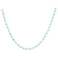 Uncut Emerald and Yellow Gold Necklace