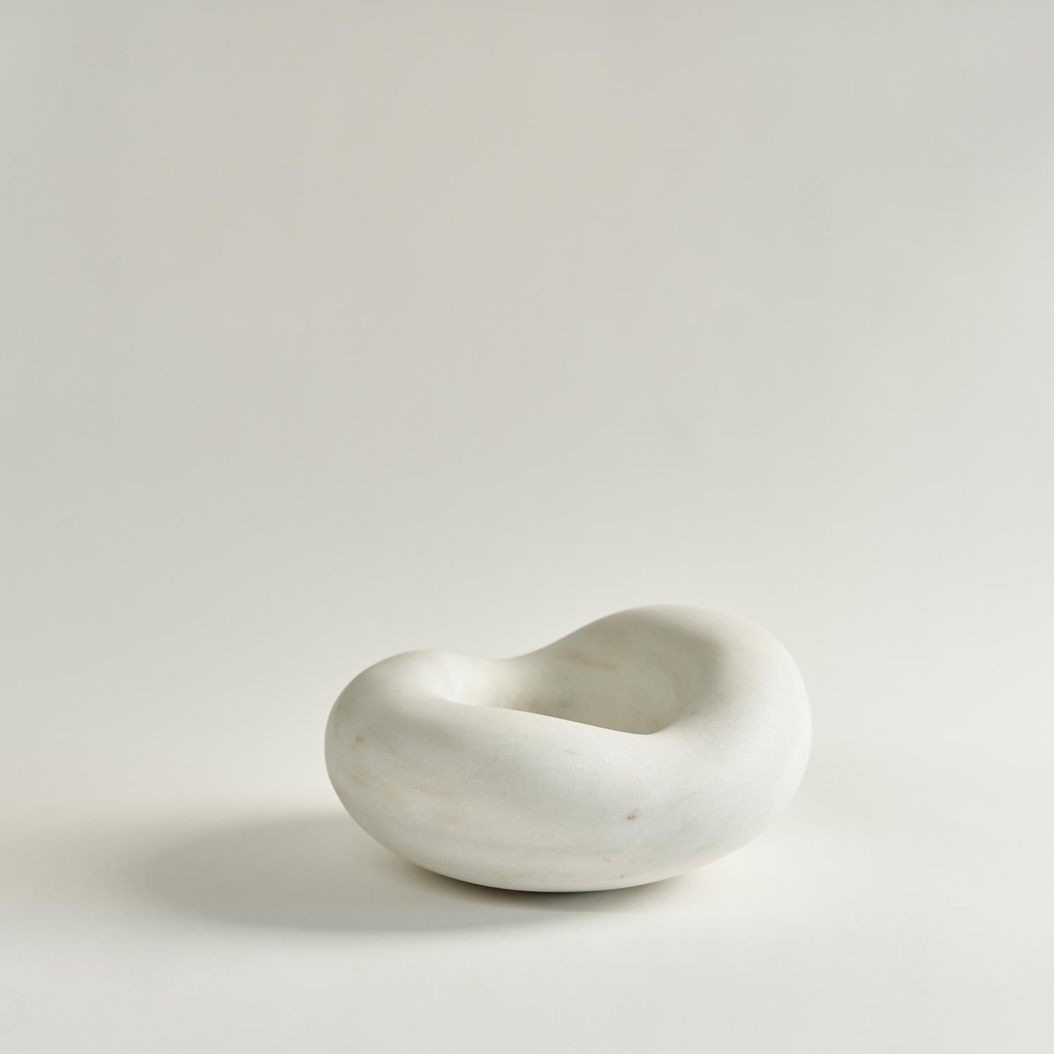 Unda Form sculpture by Dust and Form
Dimensions: D 27 x W 25 x H 12 cm
Materials: vermont imperial Danby marble

In Latin, the word “unda” is used to describe water, specifically ripples, waves or a body of flowing water. Water’s ever changing