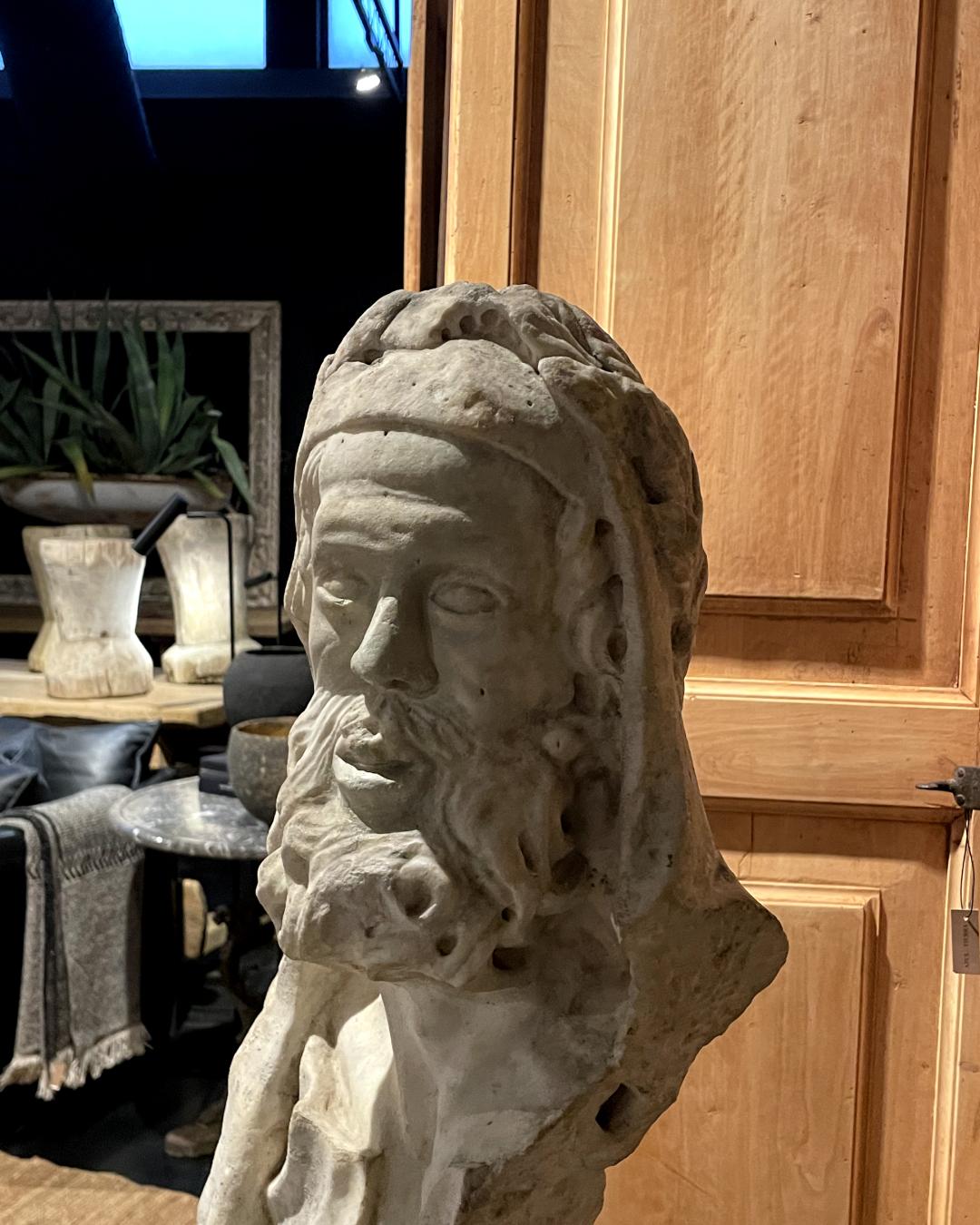 Unveil the enigma of our Marble Male Bust from France, an undated masterpiece shrouded in historical allure. This finely sculpted piece captures the essence of a bygone era, portraying a male figure with regal bearing, reminiscent of historical