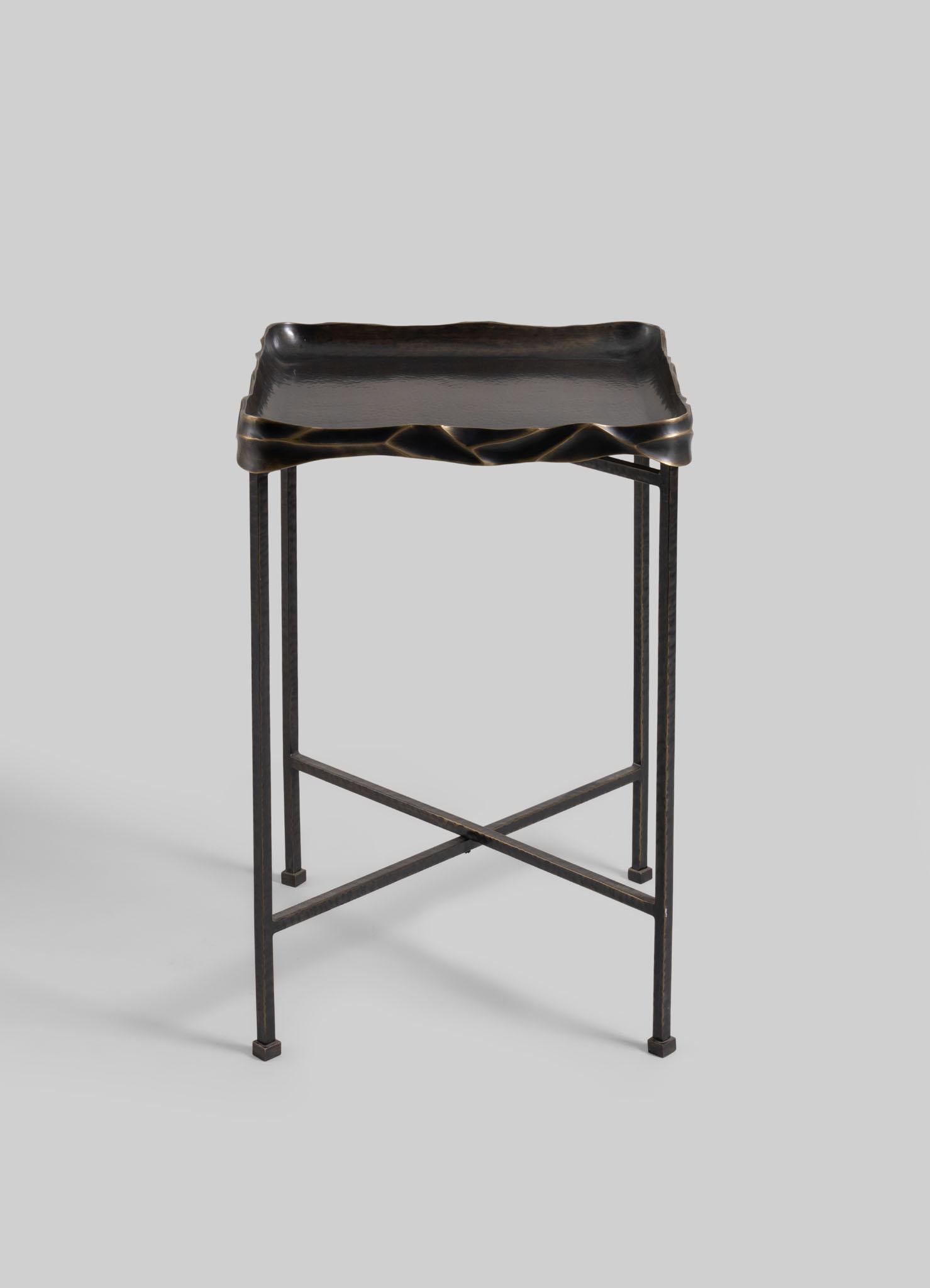 Under The Banyan Tray Table Medium in Brass, Viya by Vikram Goyal

Echoing ancient whispers of worship, each object captures the essence of the Banyan tree, believed to hold the divine power to fulfil wishes. Crafted with reverence, these pieces pay