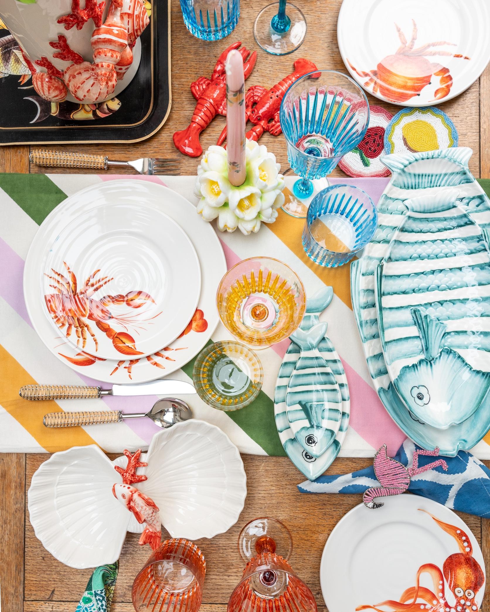 Bring the magic of the sea to your table with the Under the Sea plates from the Menagerie d’Été collection. Crafted in white ceramic and meticulously hand-painted, each plate features a vibrant composition of marine life -octopus, crab, lobster, and