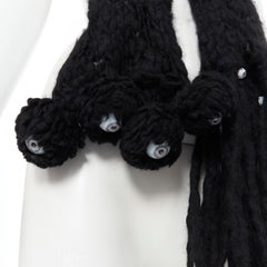 UNDERCOVER Schwarzer Winterschal aus Wolle mit klobigem Strick und eye ball verzierten Fransen
